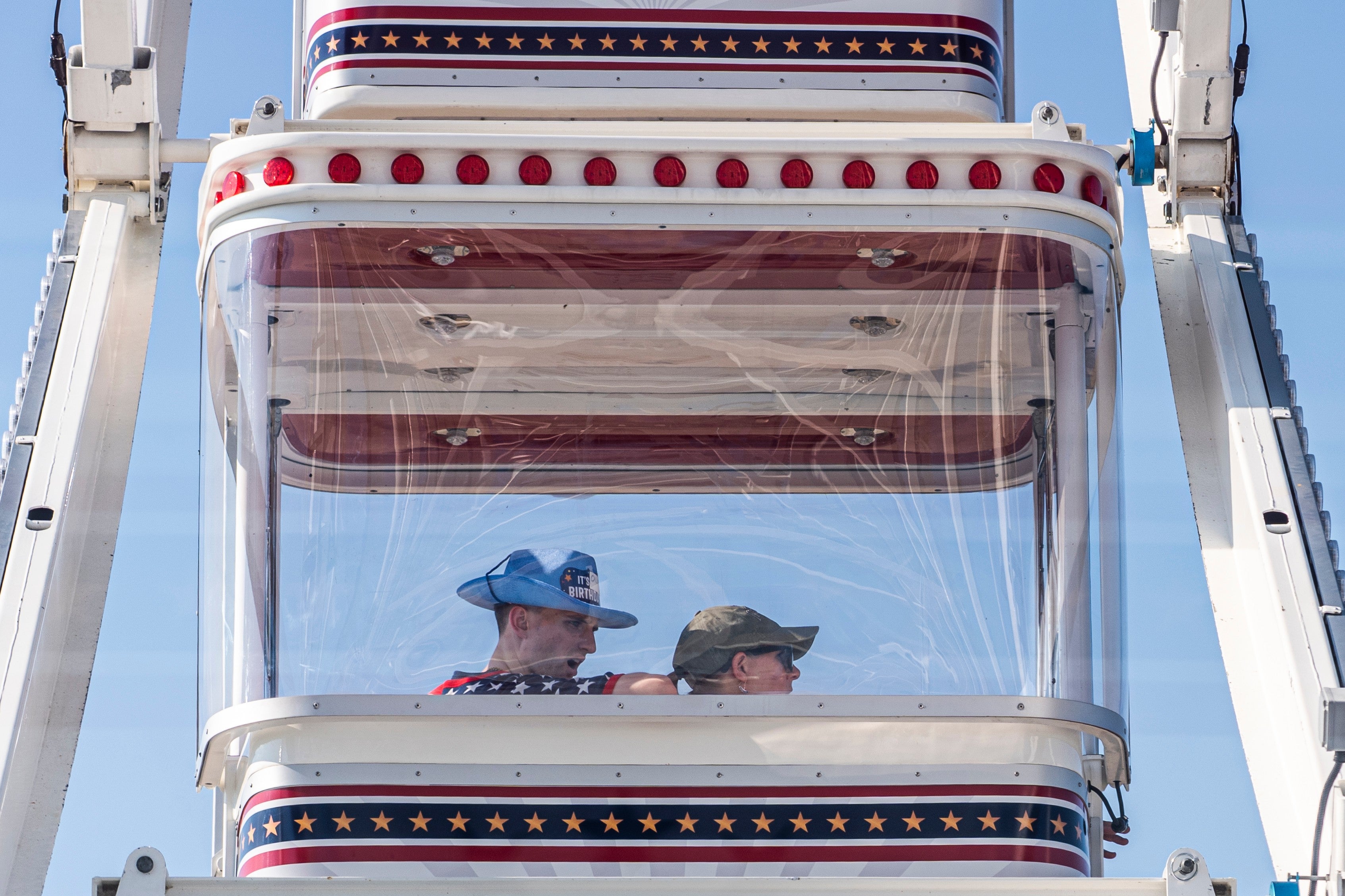 A Ferris wheel appears to be one of the main draws at the Great American State Fair, which has struggled with empty booths and weather delays