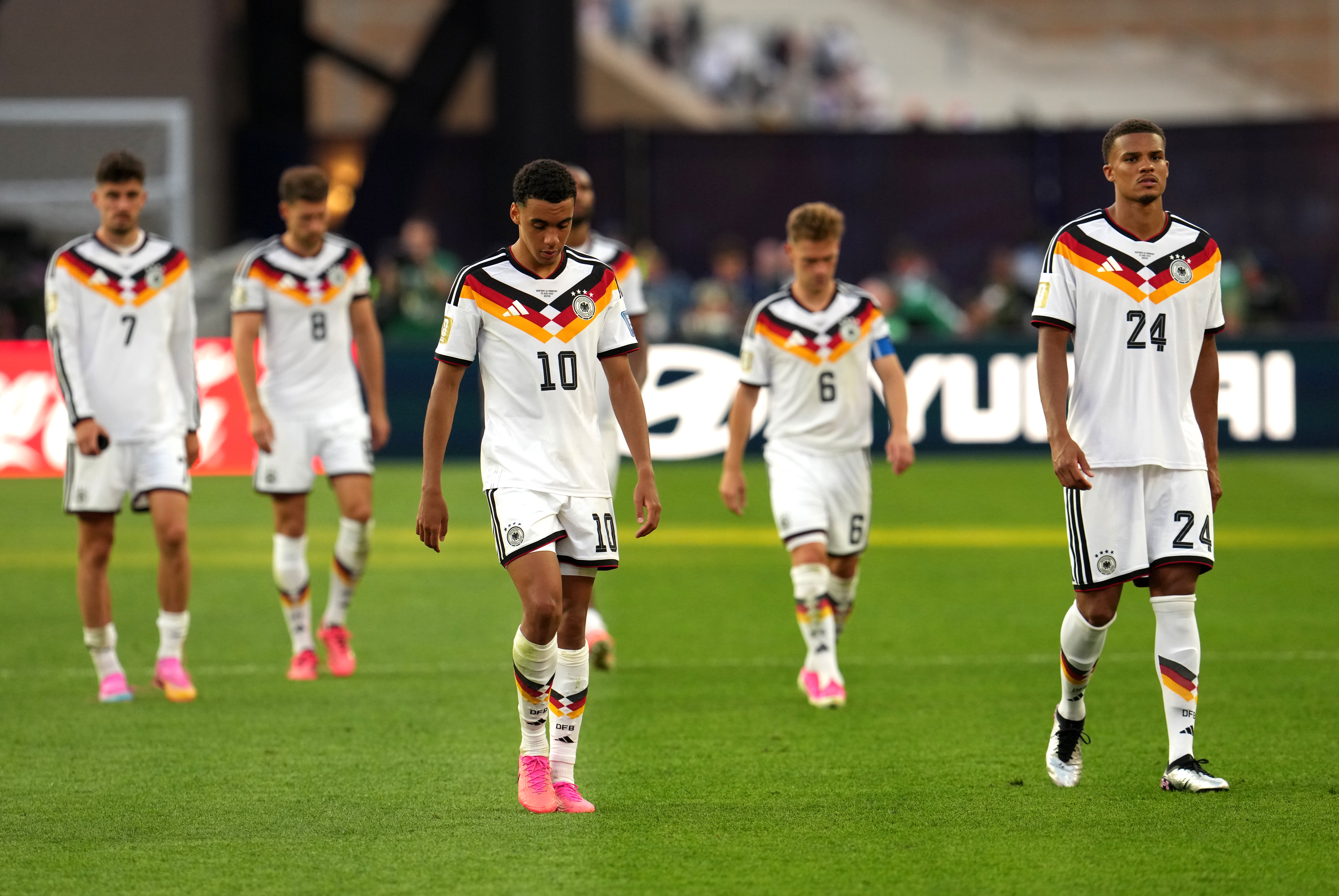 Germany's Jamal Musiala appears dejected after defeat