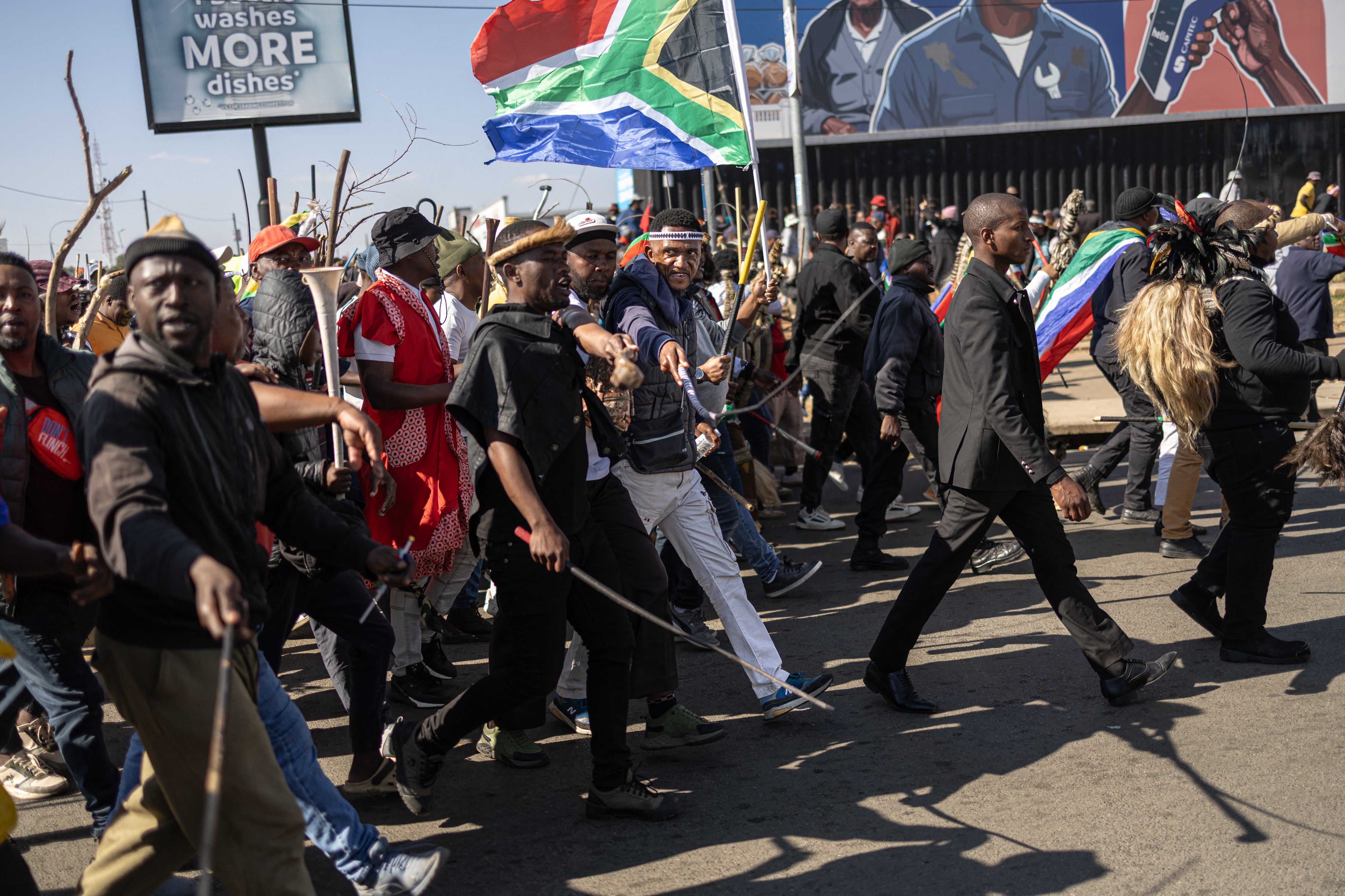Protesters take part during a march againts undocumented migrants in Soweto.