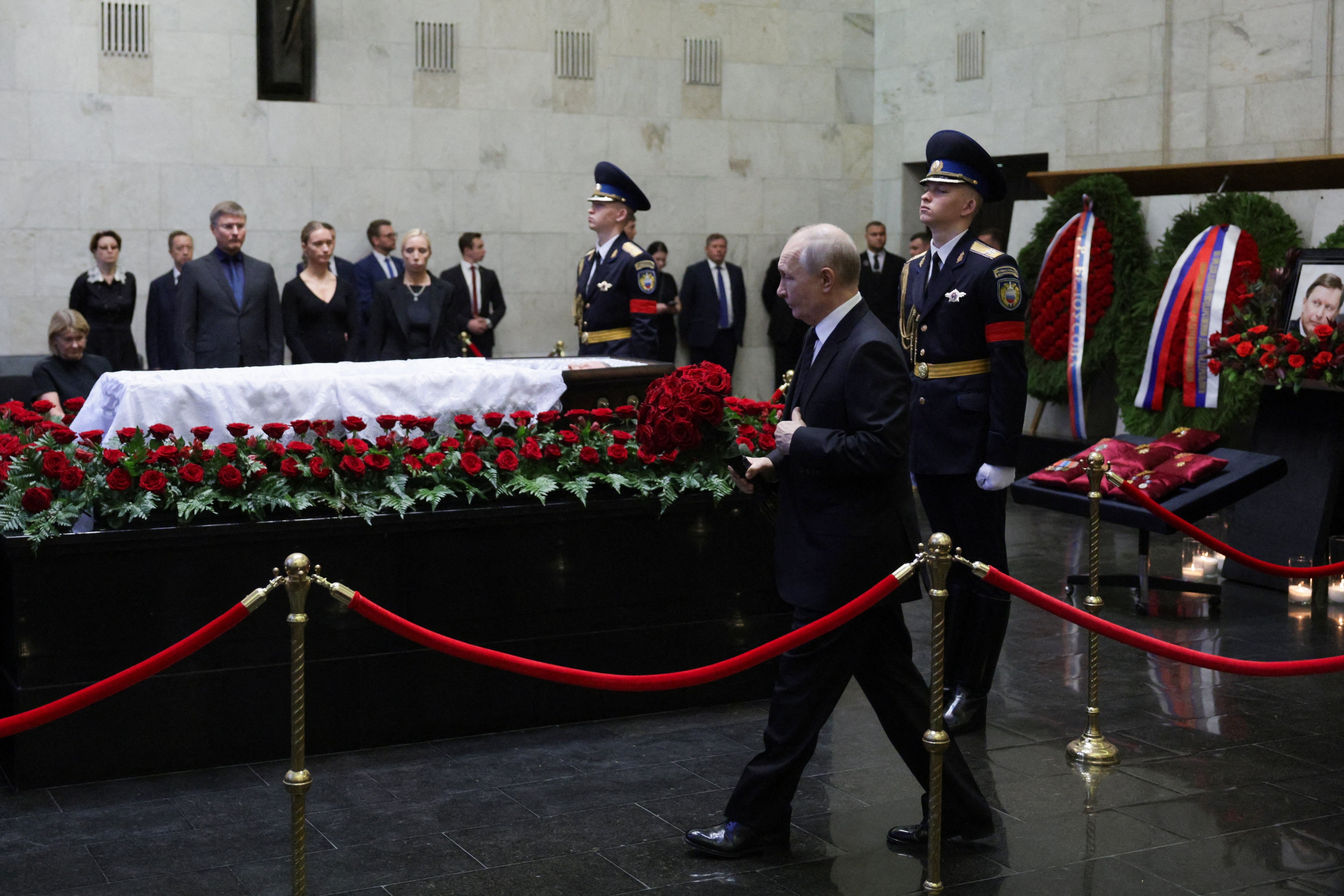 Russia's President Vladimir Putin pays his last respects to the late former defence minister Sergei Ivanov during a farewell ceremony in Moscow on June 30 (AFP/Getty)
