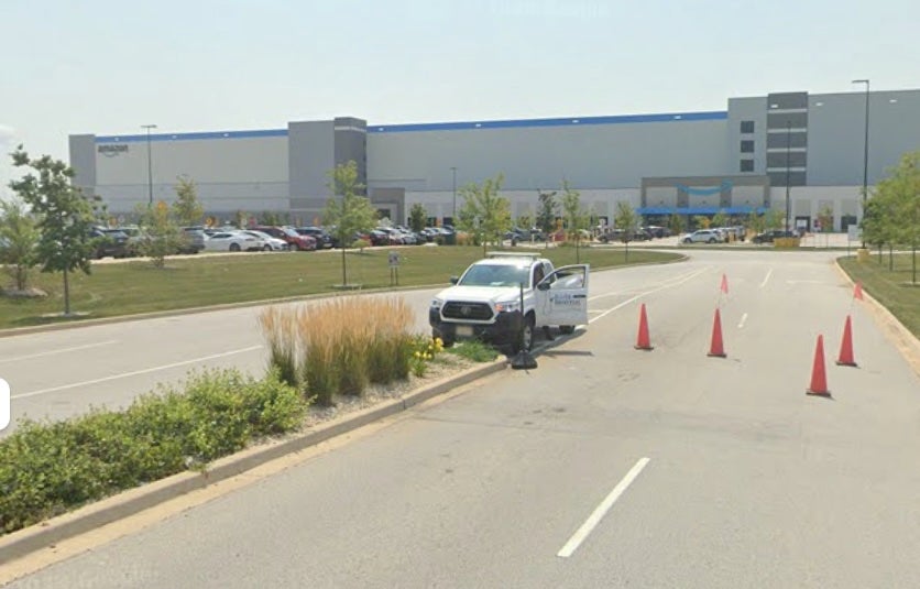 An Amazon worker was fatally shot by a food delivery driver in the parking lot of the online retailer’s distribution center outside of Chicago, according to police