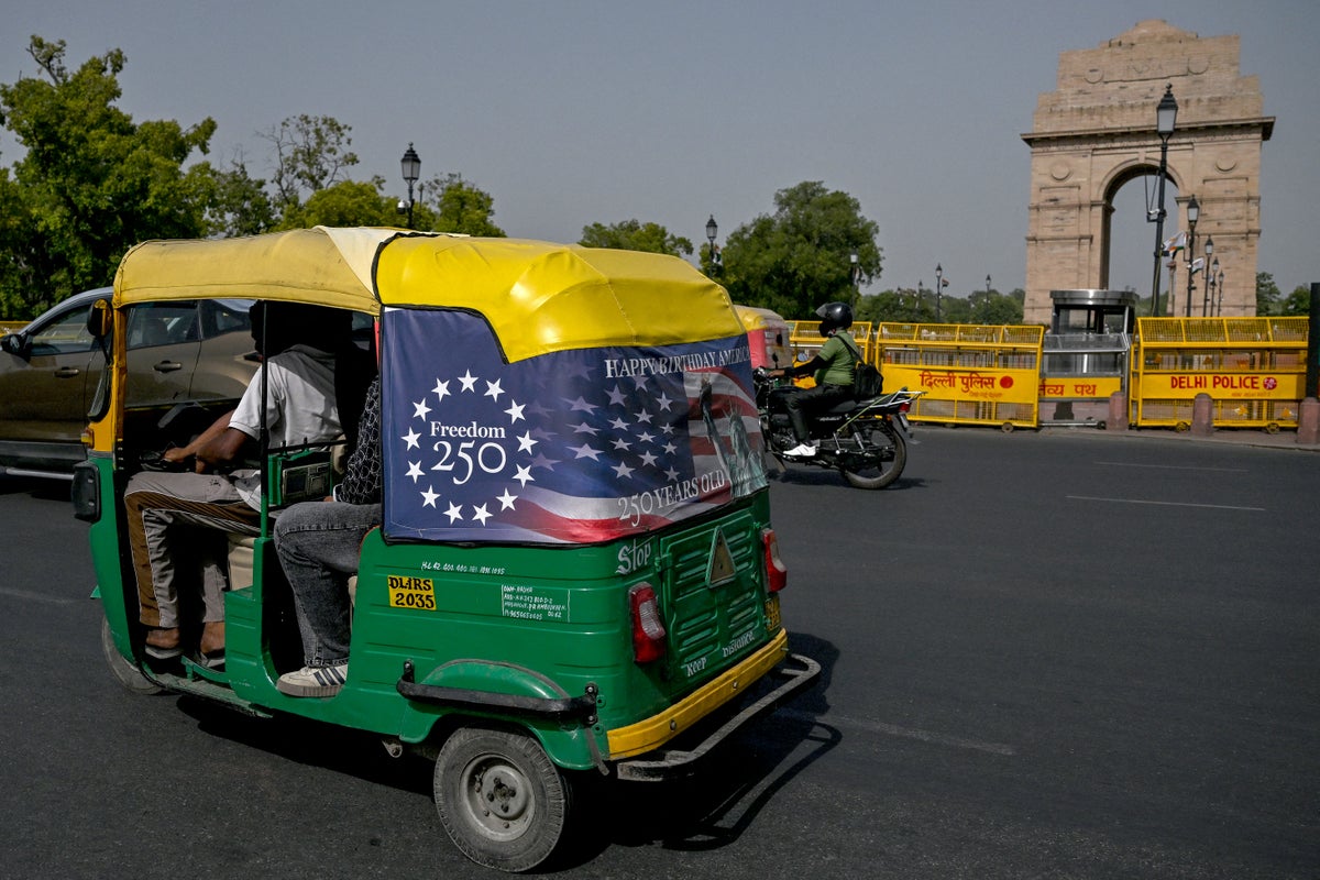 Why Trump’s face can be seen zooming in and out of India’s rush-hour traffic