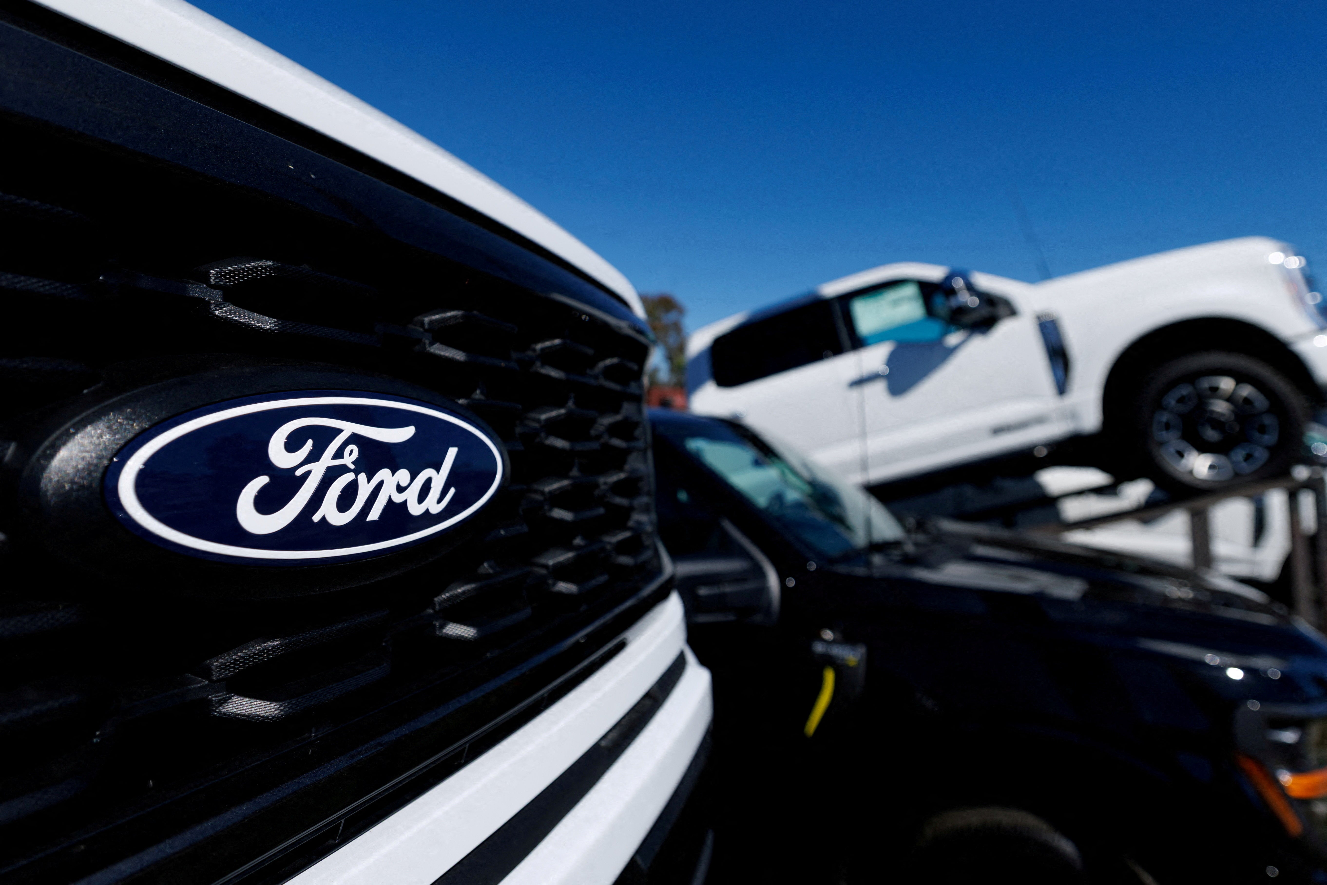 A Ford logo on a Ford F-150 pickup truck for sale in Encinitas, California