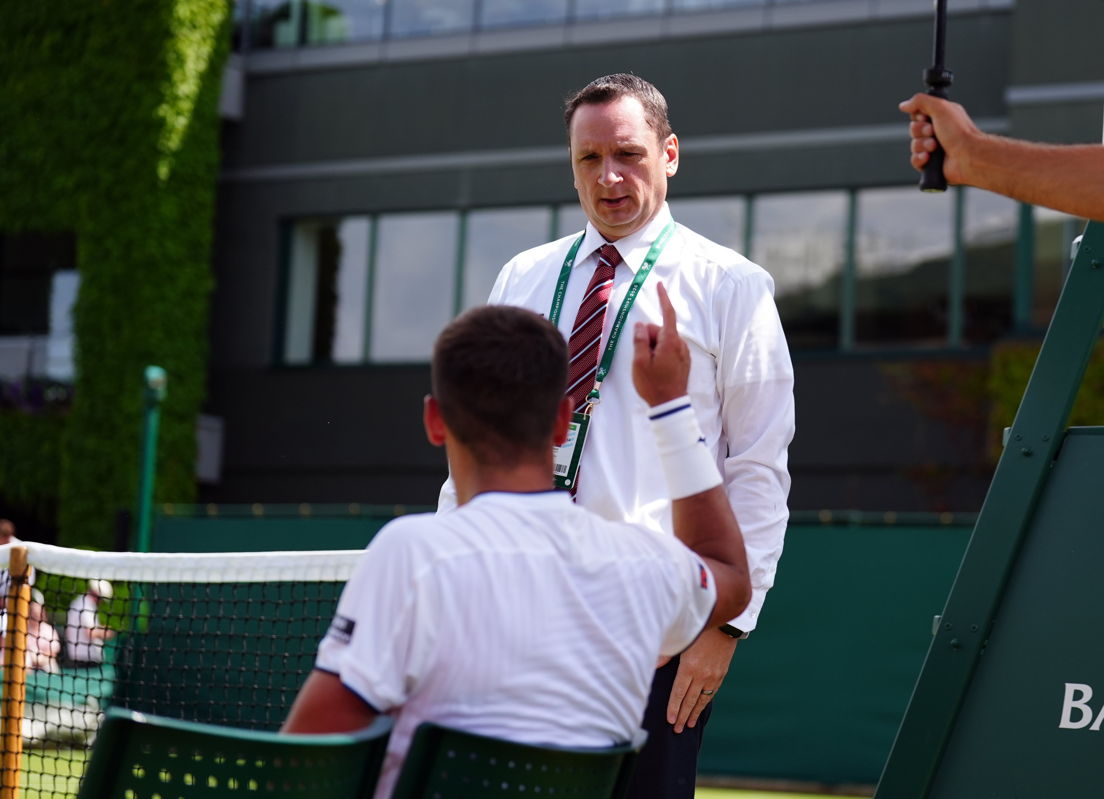 Damir Dzumhur speaking with match referee Jake Garner