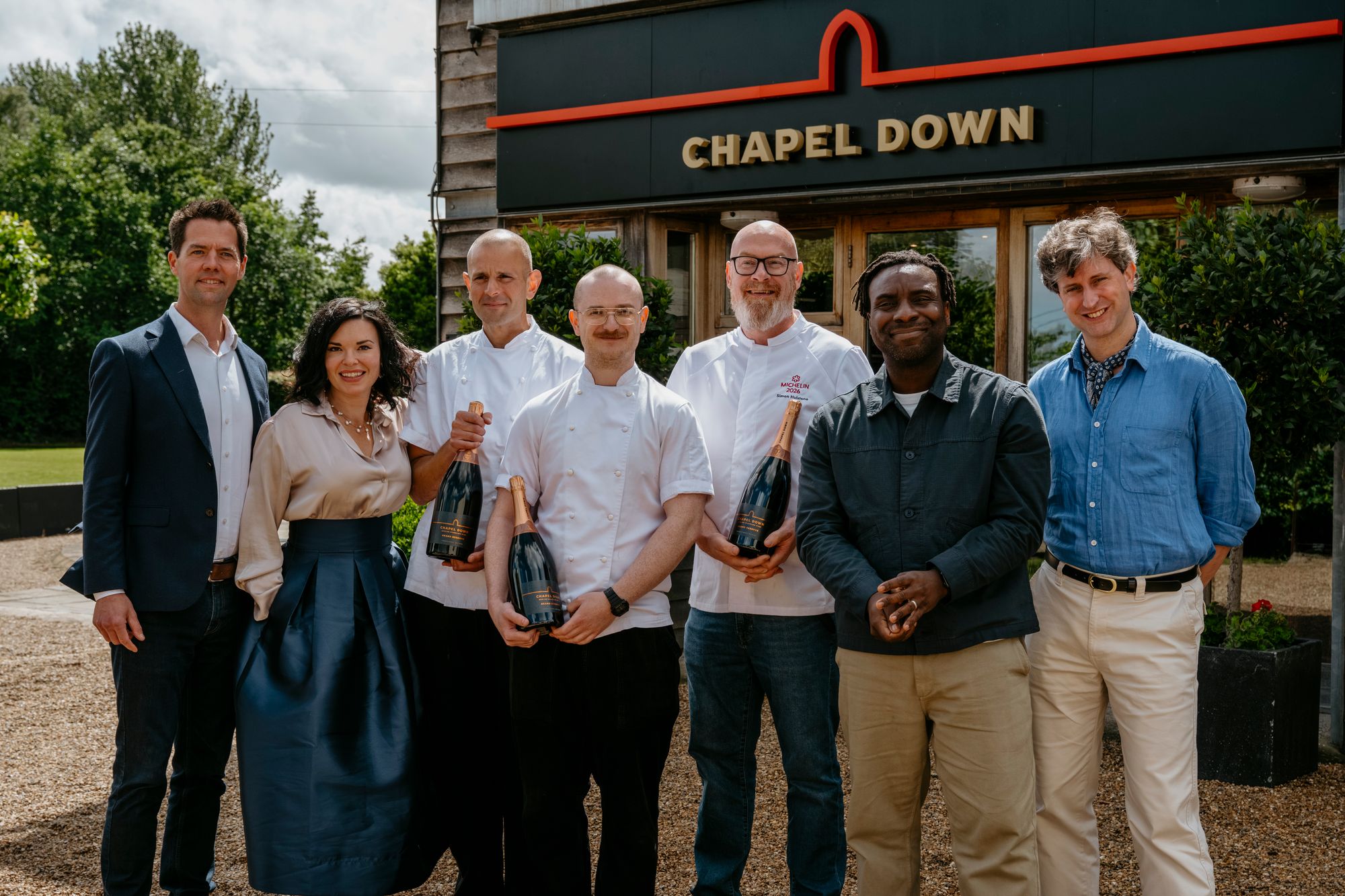 The winning chefs flanked by their judges (from left): Josh Donaghay-Spire, Libby Brodie, Martin Carabott, Ethan Pack, Simon Hulstone, Jimi Famurewa and David Ellis