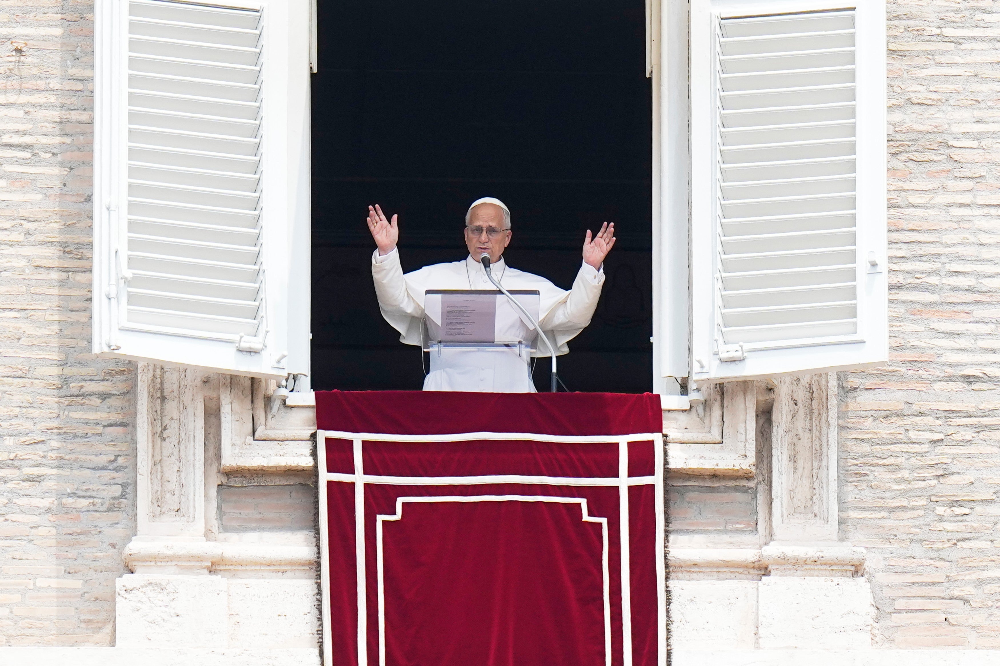 Pope Leo XIV waves during the Angelus noon prayer from the window of his studio overlooking St.Peter's Square, at the Vatican, Monday, June 29, 2026. (AP Photo/Alessandra Tarantino) (Copyright 2026 The Associated Press. All rights reserved)