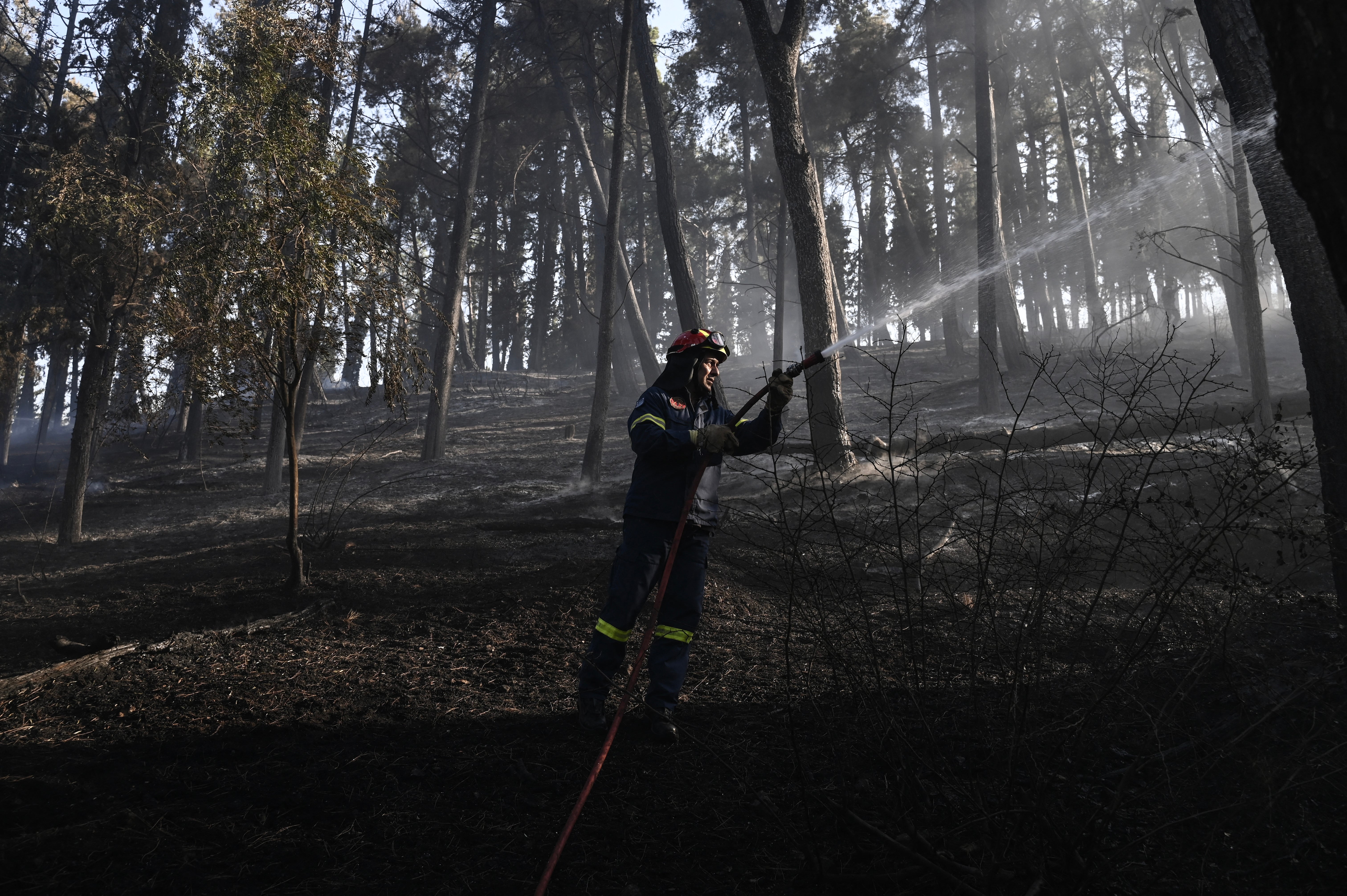 A firefighter near the blaze north of Thessaloniki on June 30, 2026. (AFP/Getty)