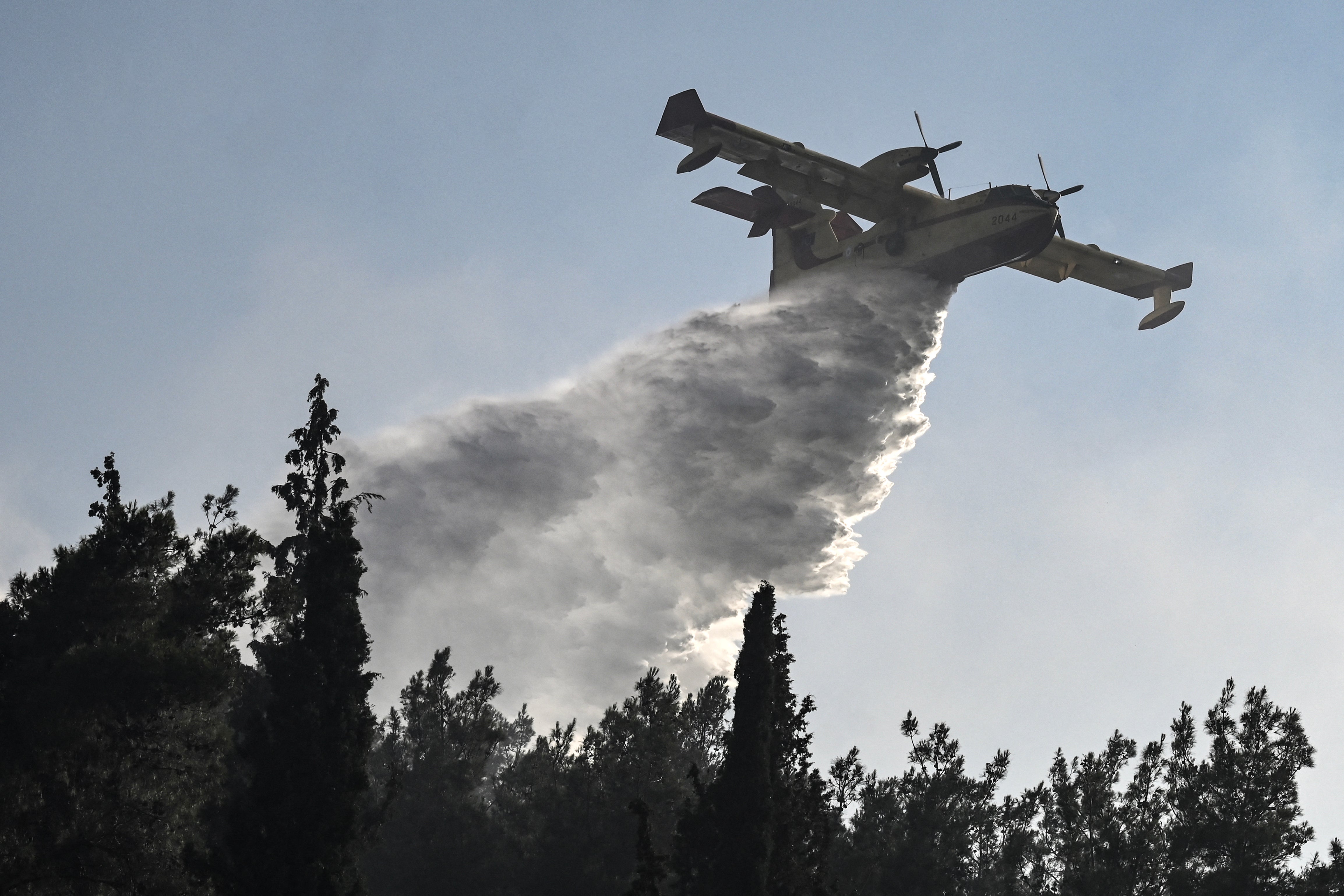 Two dead as wildfires gut house in northern Greece as village evacuated