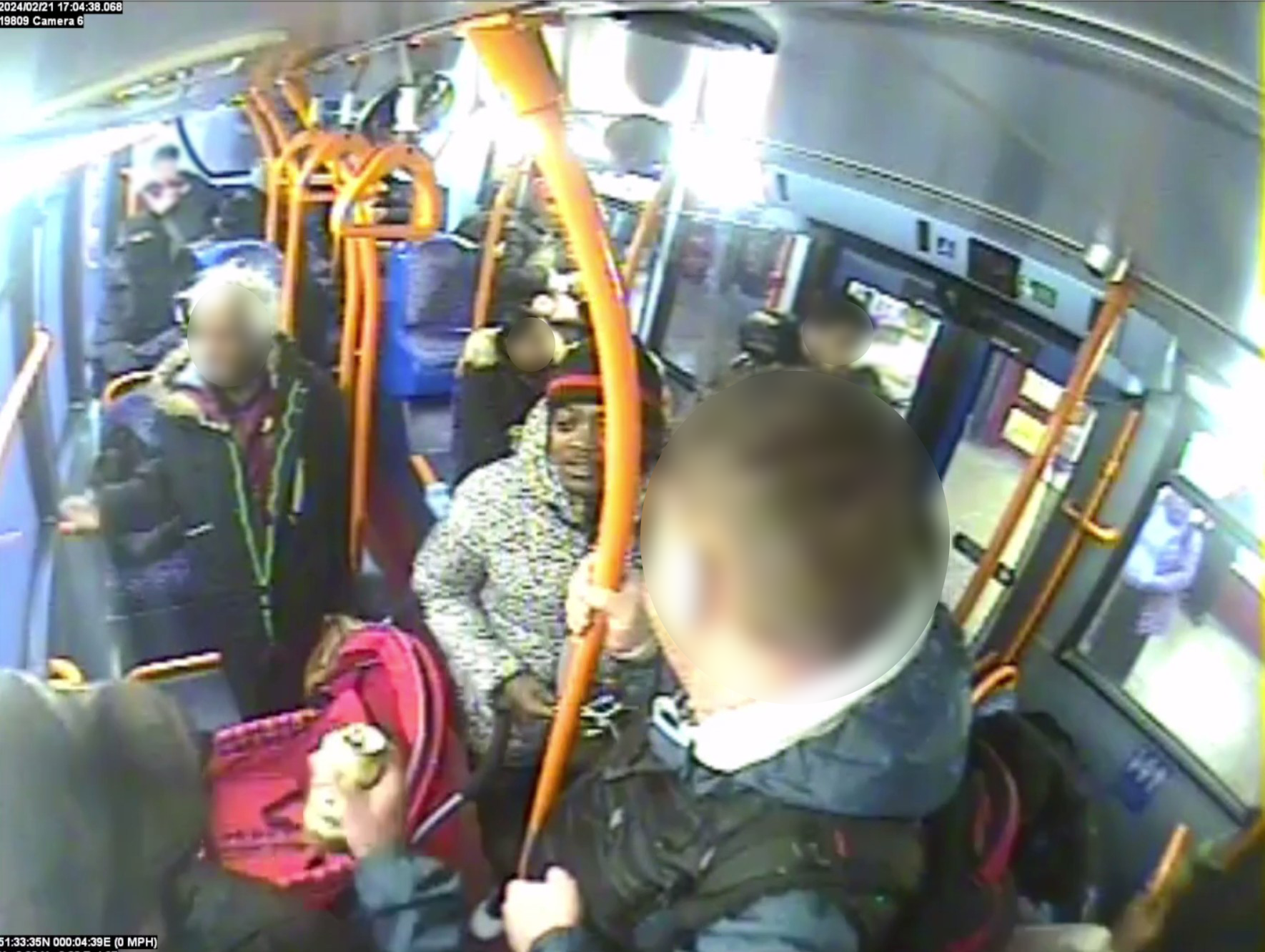 Rasheed Rahman talking to the Cavaliuc brothers on the 86 bus (CPS/ Met police)