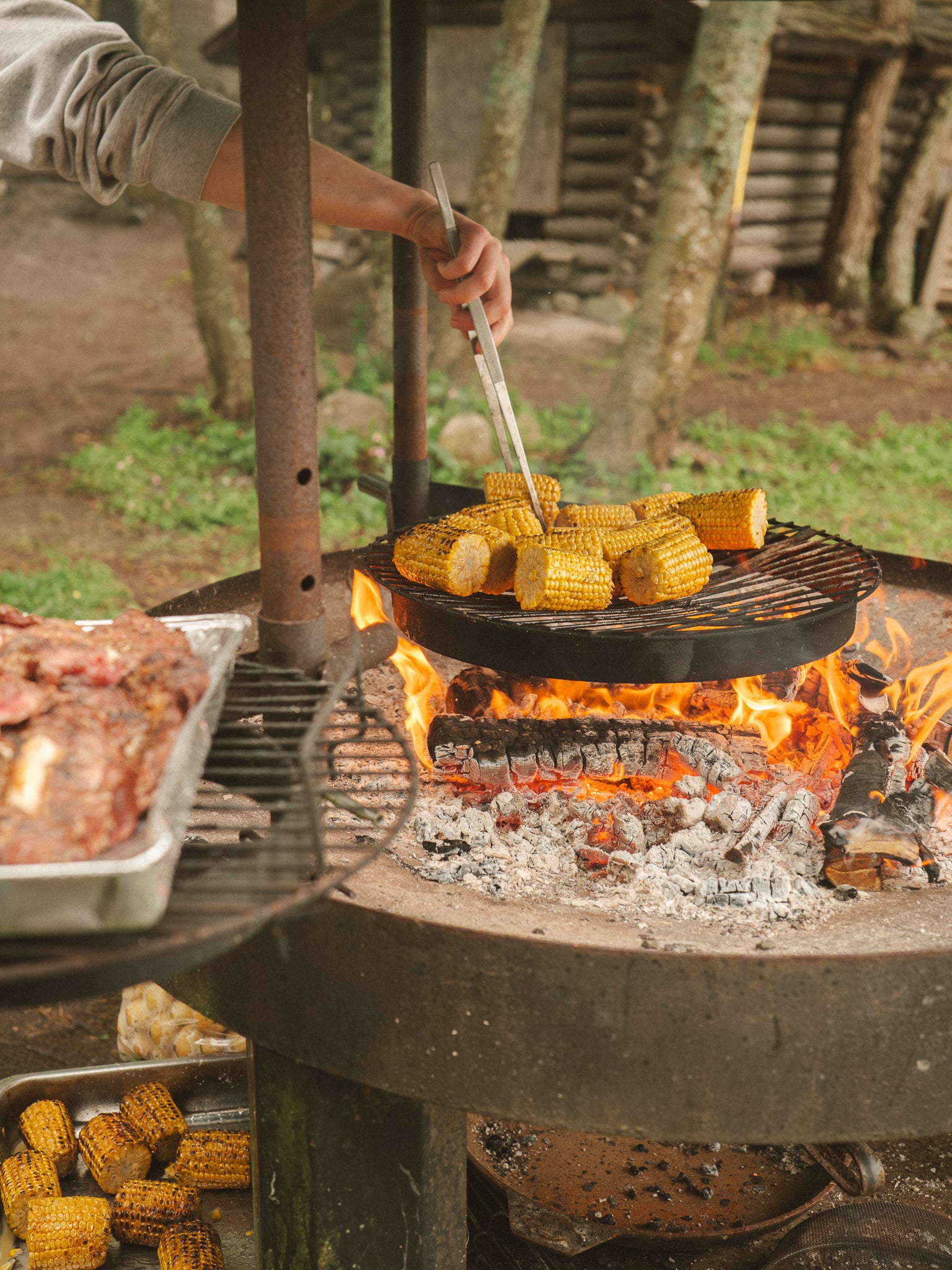 Dinner is cooked over an open fire