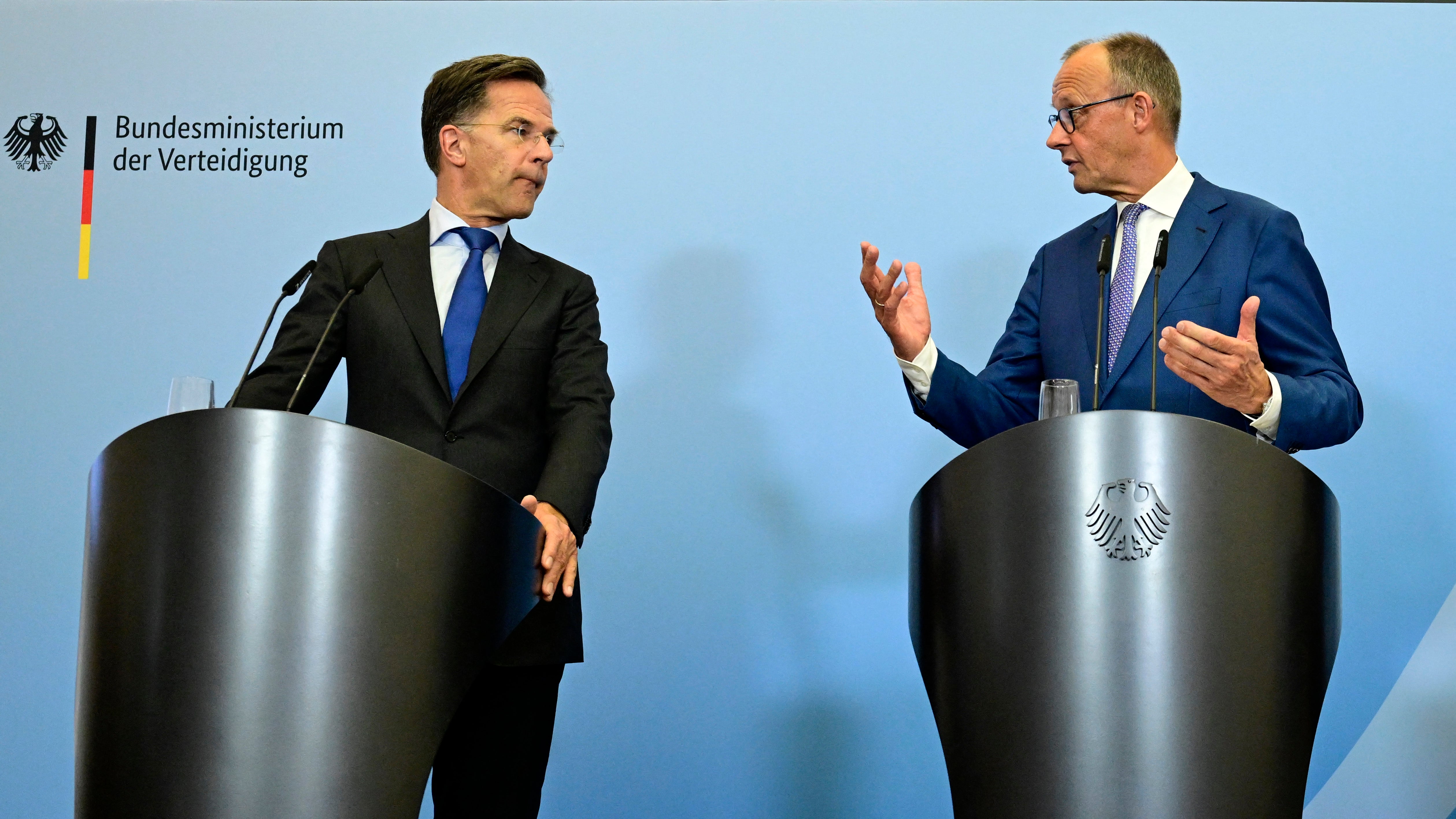 Nato secretary general Mark Rutte and German Chancellor Friedrich Merz address a press conference during their meeting on July 1 (AFP/Getty)