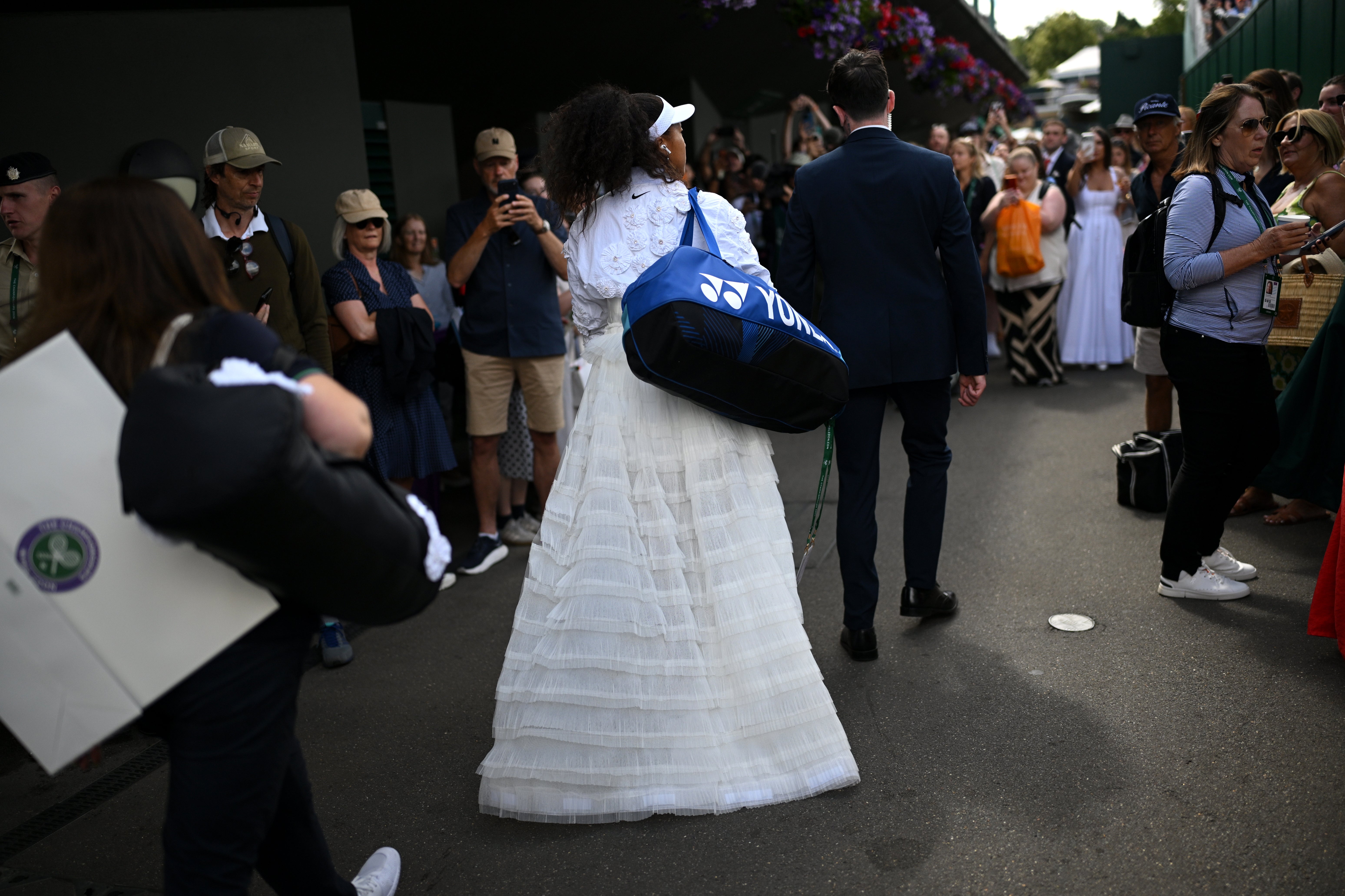 Osaka walked through the Wimbledon crowds to get to Court No 2