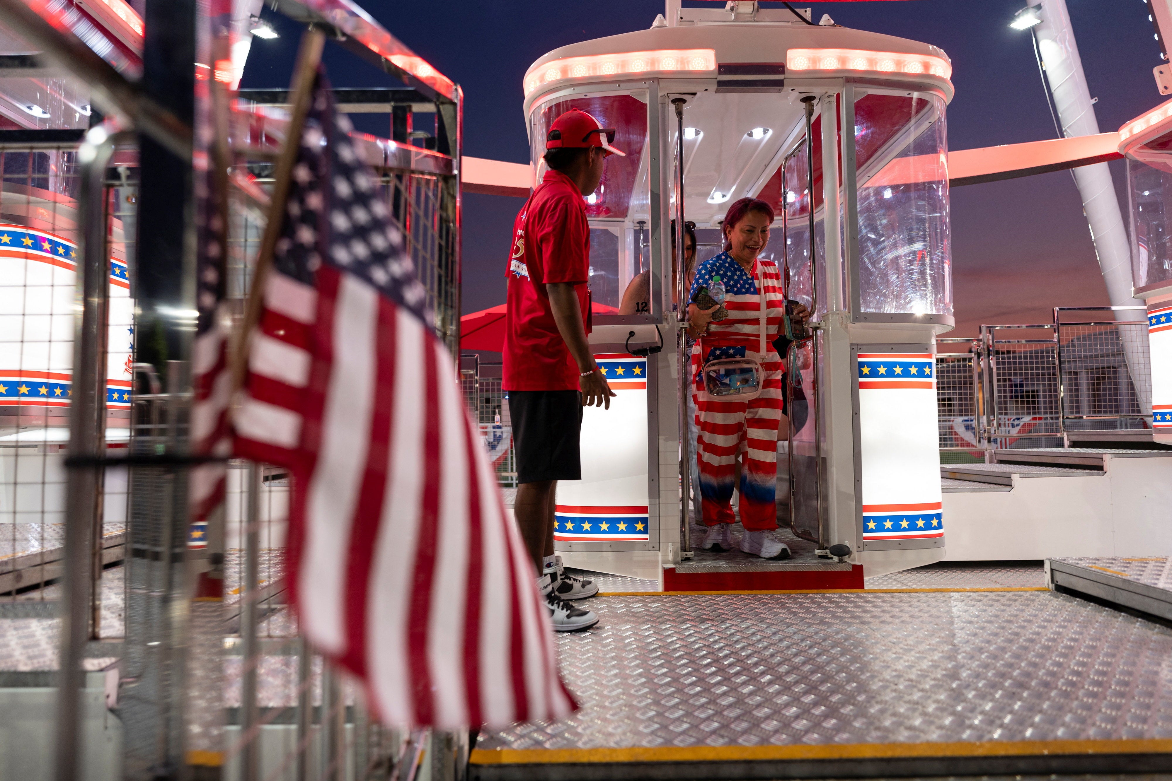 In fact, the only fairground ride at the fair seemed to be the large Ferris Wheel, with relatively few lining up to ride (Reuters)
