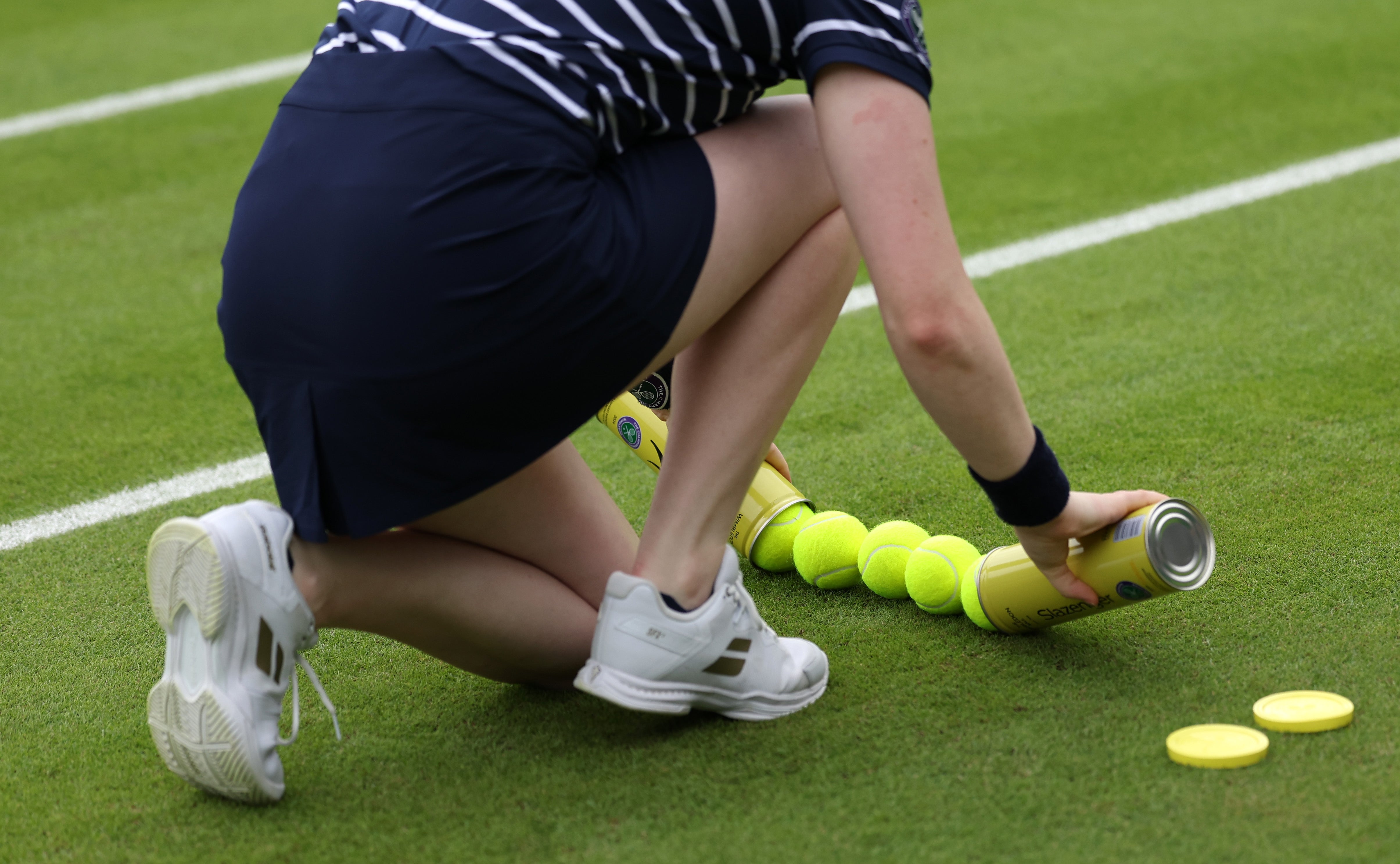 Wimbledon’s many ball boys and ball girls (known as “BBGs”) go through a tough selection to try out for the much sought-after role (Getty)