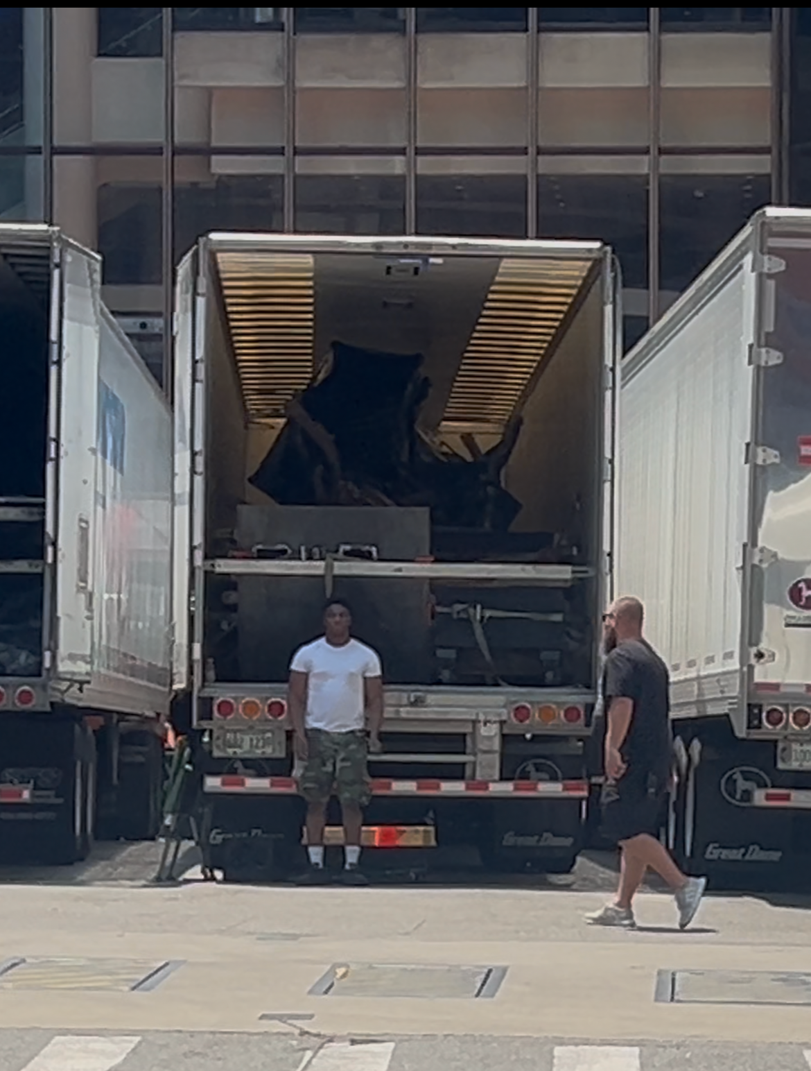Massive trees were seen being taken into Madison Square Garden ahead of Taylor Swift and Travis Kelce's wedding (Carsen Holaday/The Independent)