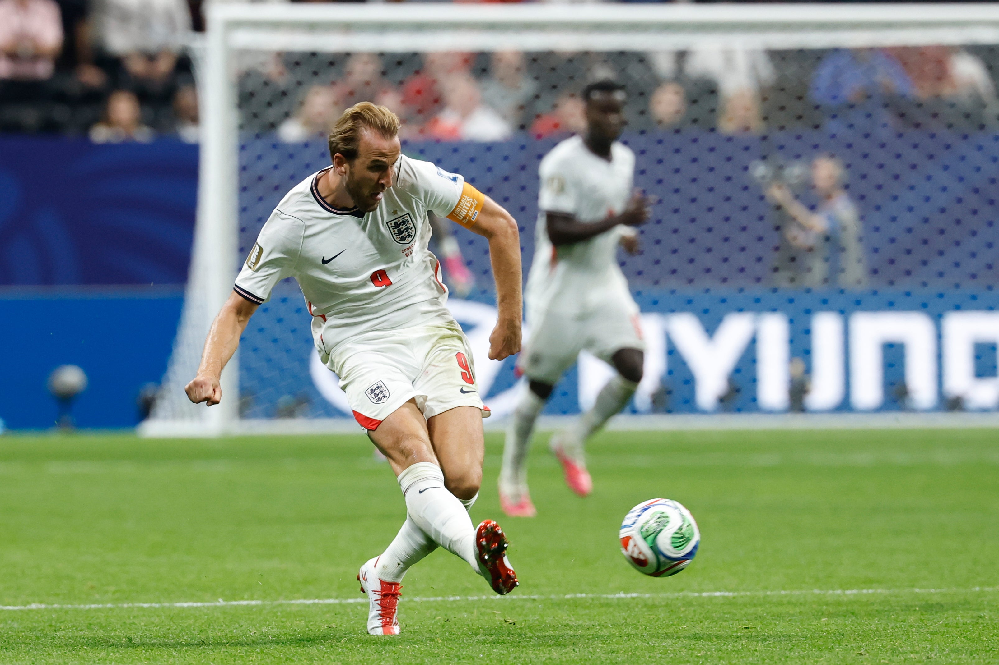 England's Harry Kane kicks the ball during the World Cup round of 32