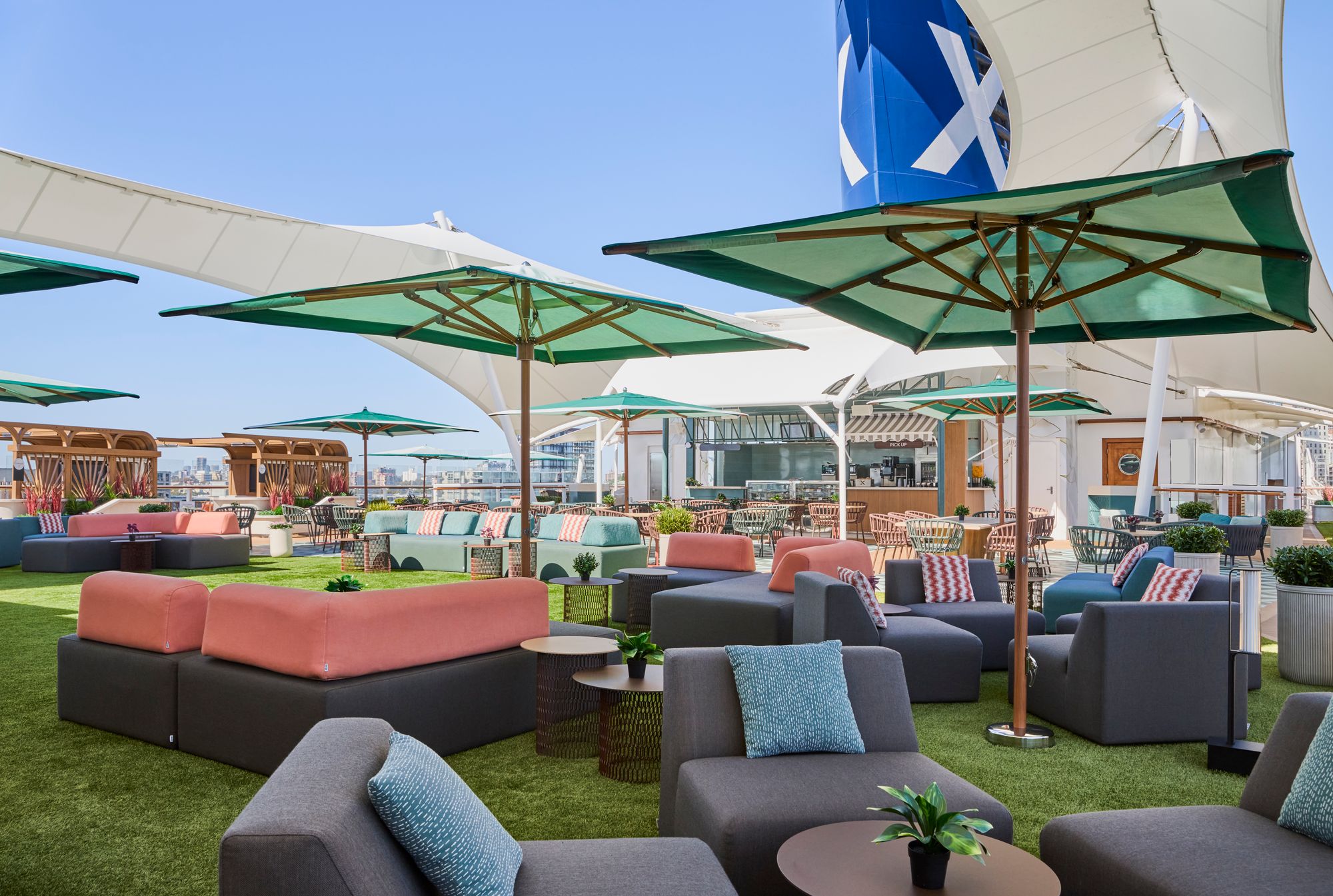 Sunset Park features a vast open-air space with ample seating to watch the mountainous landscapes on an Alaskan sailing