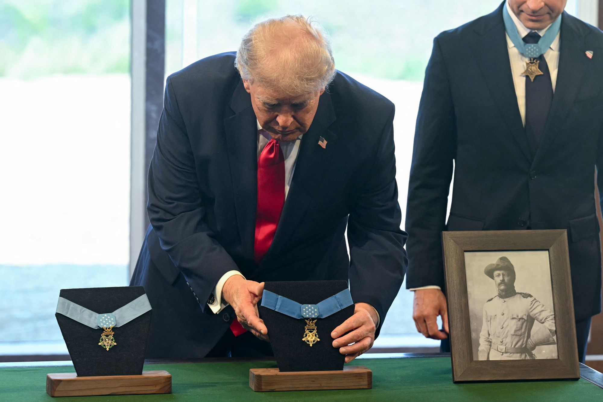 Trump donated Teddy Roosevelt's Medal of Honor to the 26th president's new library in North Dakota — and said he wants one for himself (AFP via Getty Images)