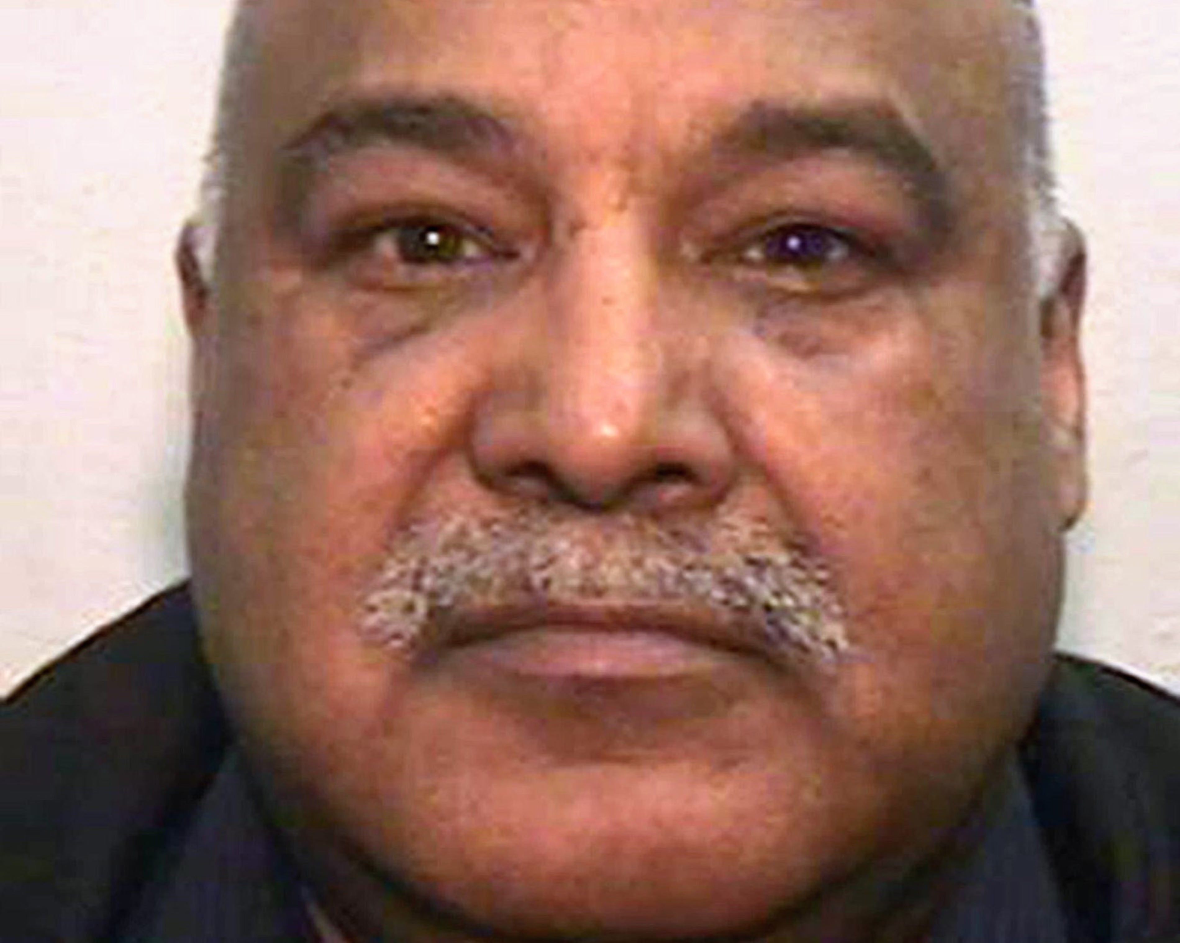 Ahmed was sentenced in 2012 as one of nine men convicted of offences against five girls (Greater Manchester Police)