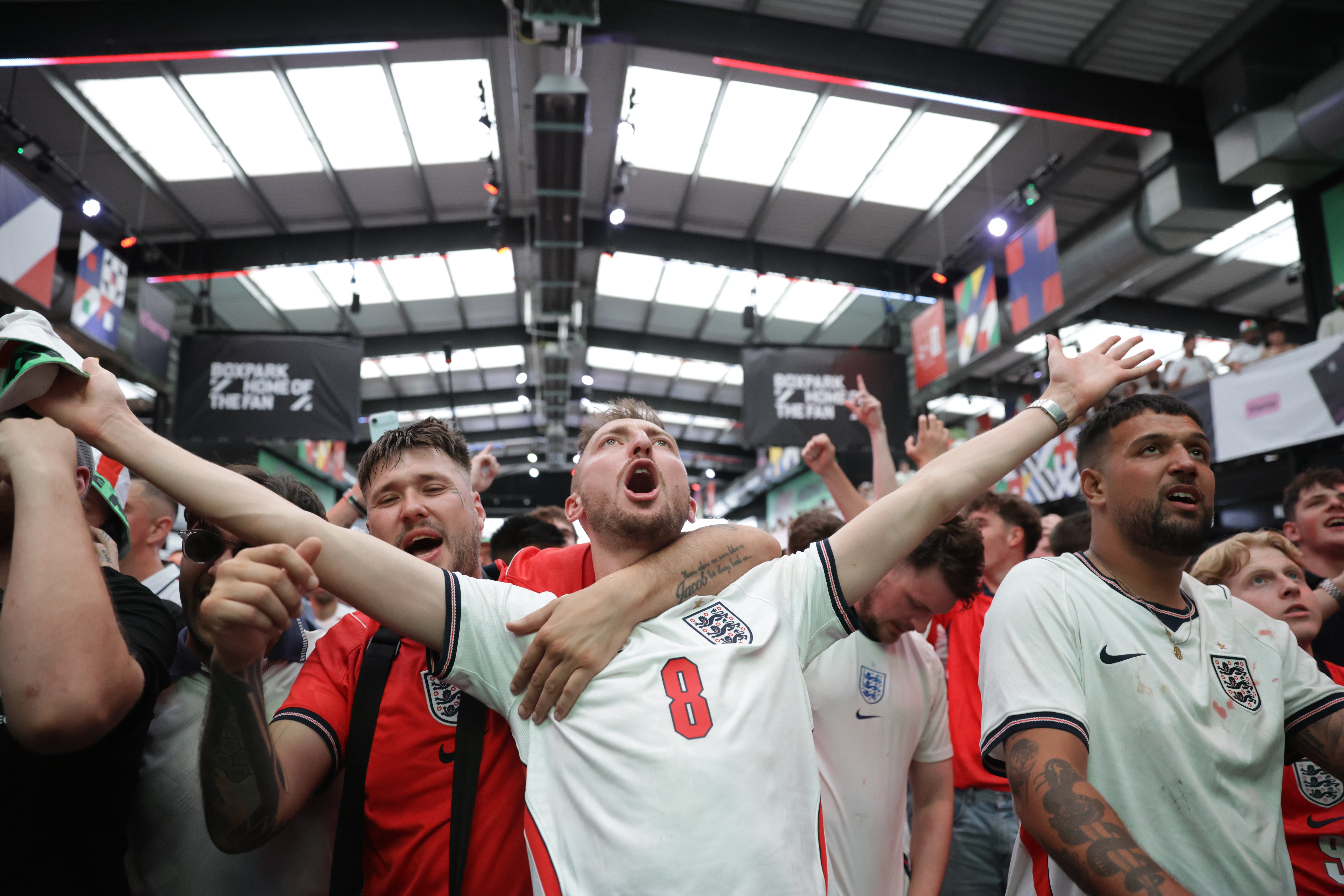 Fans watch a screening of the England match at Boxpark Wembley in London (Steven Paston/PA)
