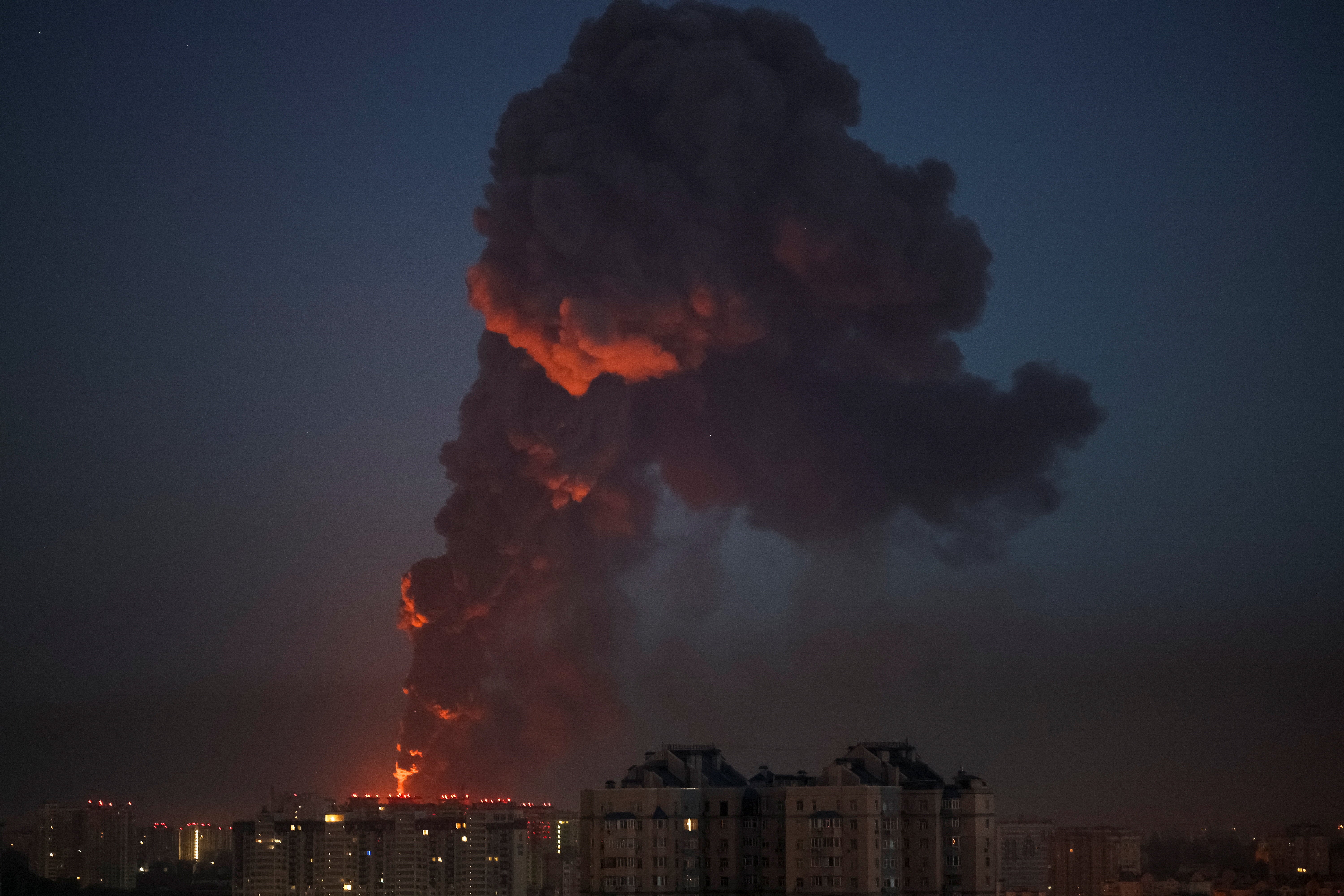 Smoke rises in the city during a Russian missile and drone strike in Kyiv