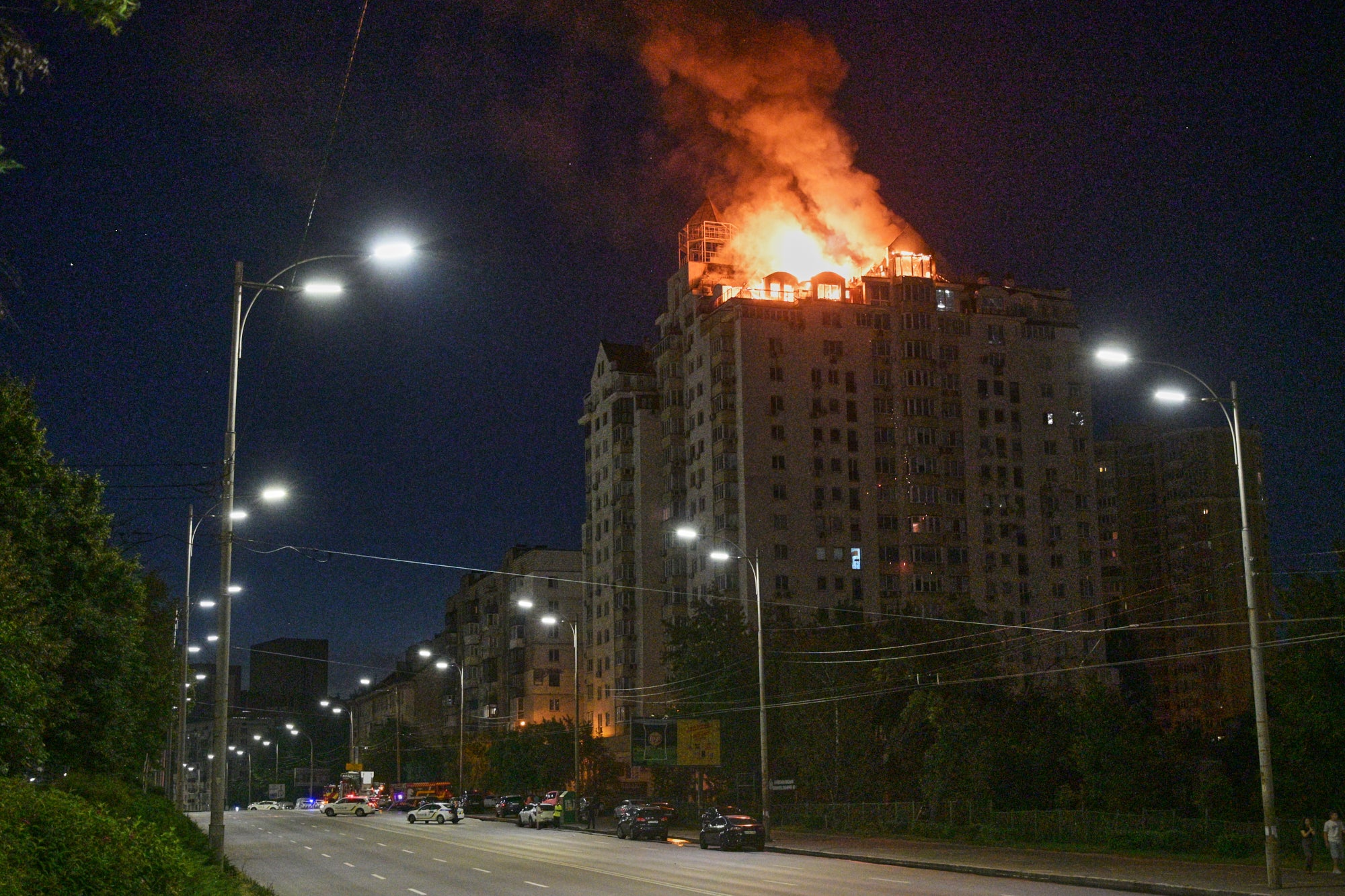 An apartment building burns following a Russian missile attack in Kyiv