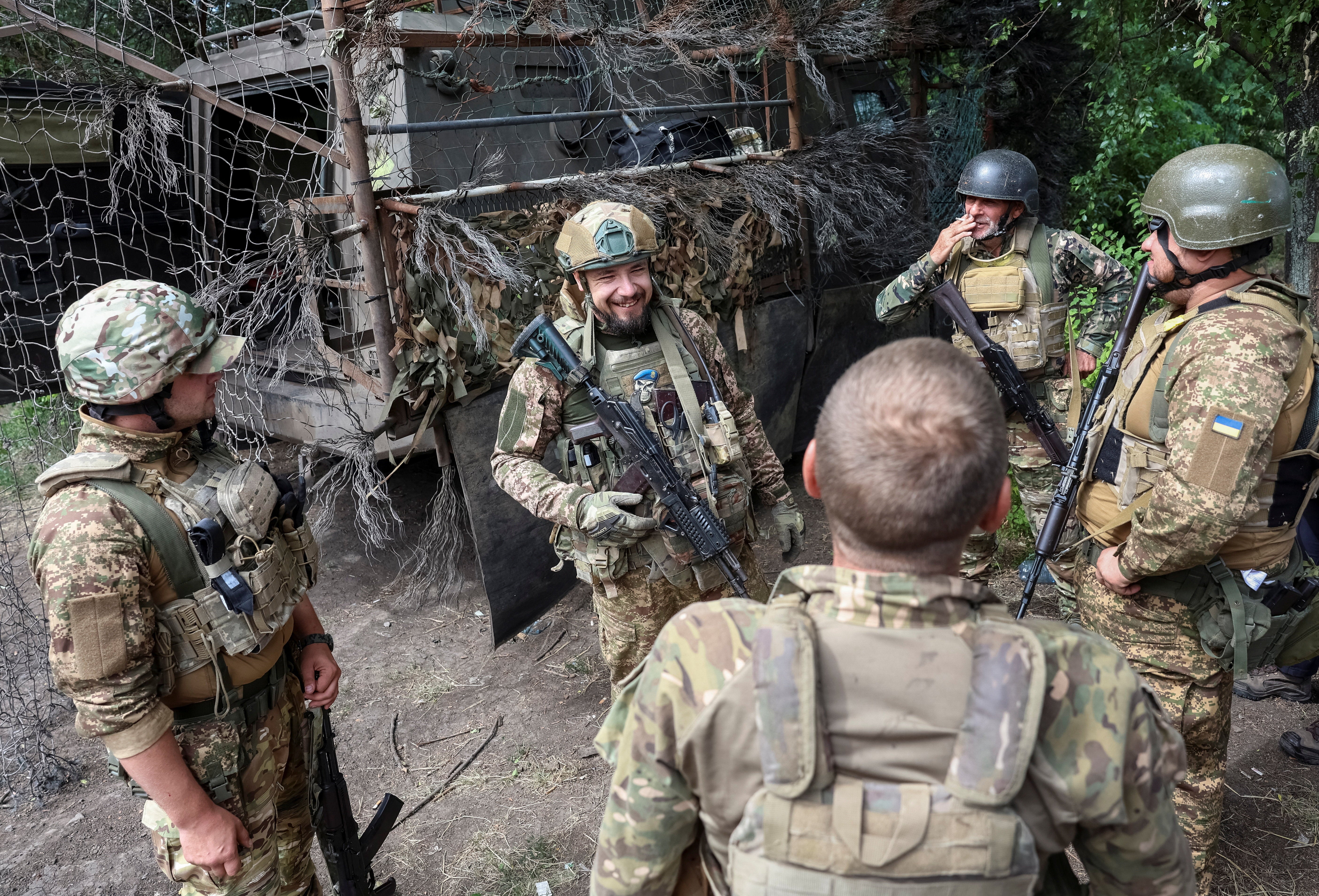 Servicemen of the 15th 'Kara-Dag' Brigade of the Operational Assignment of the National Guard of Ukraine chat before a combat mission