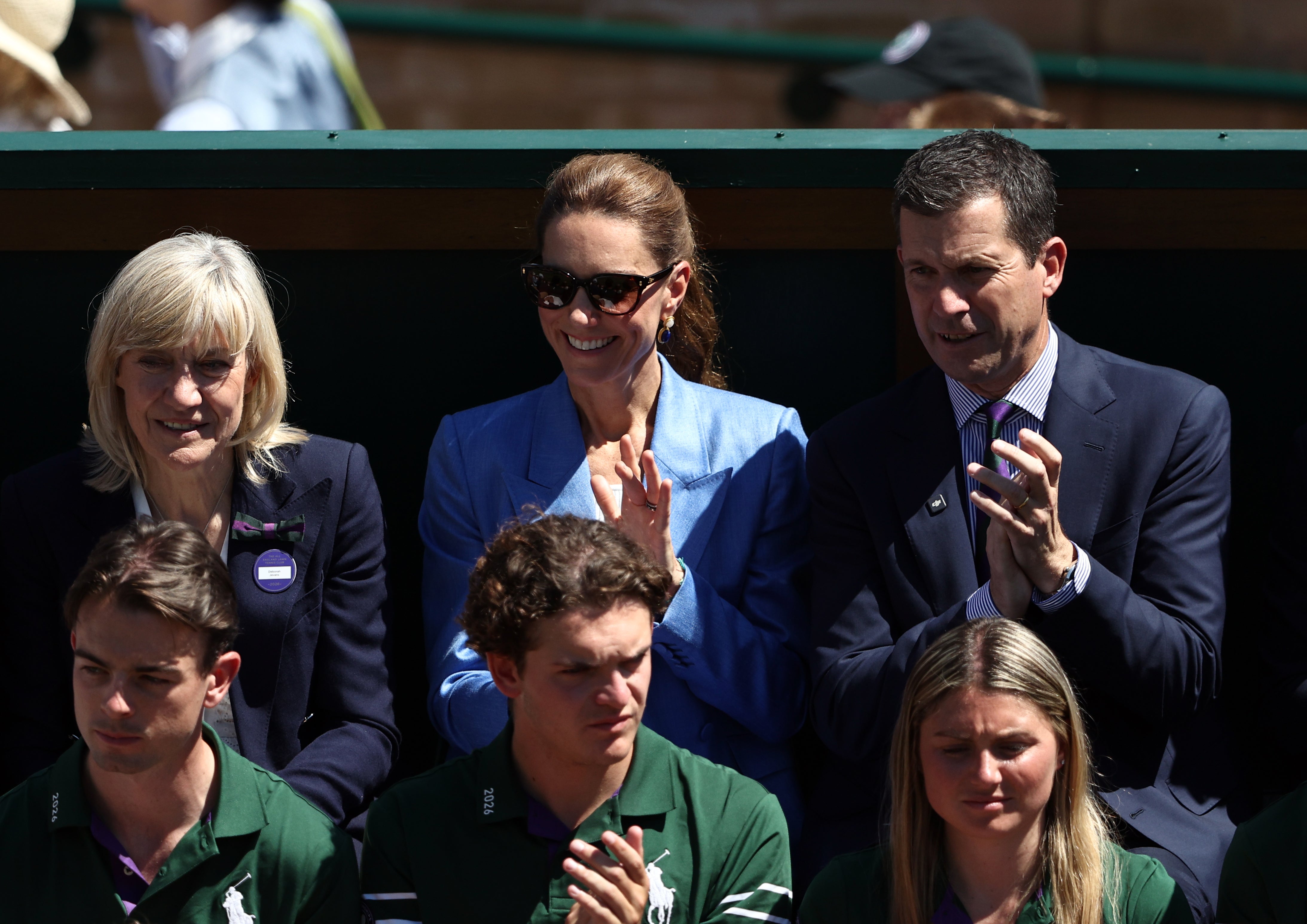 Kate wore a blue linen suit as she attended day four of Wimbledon