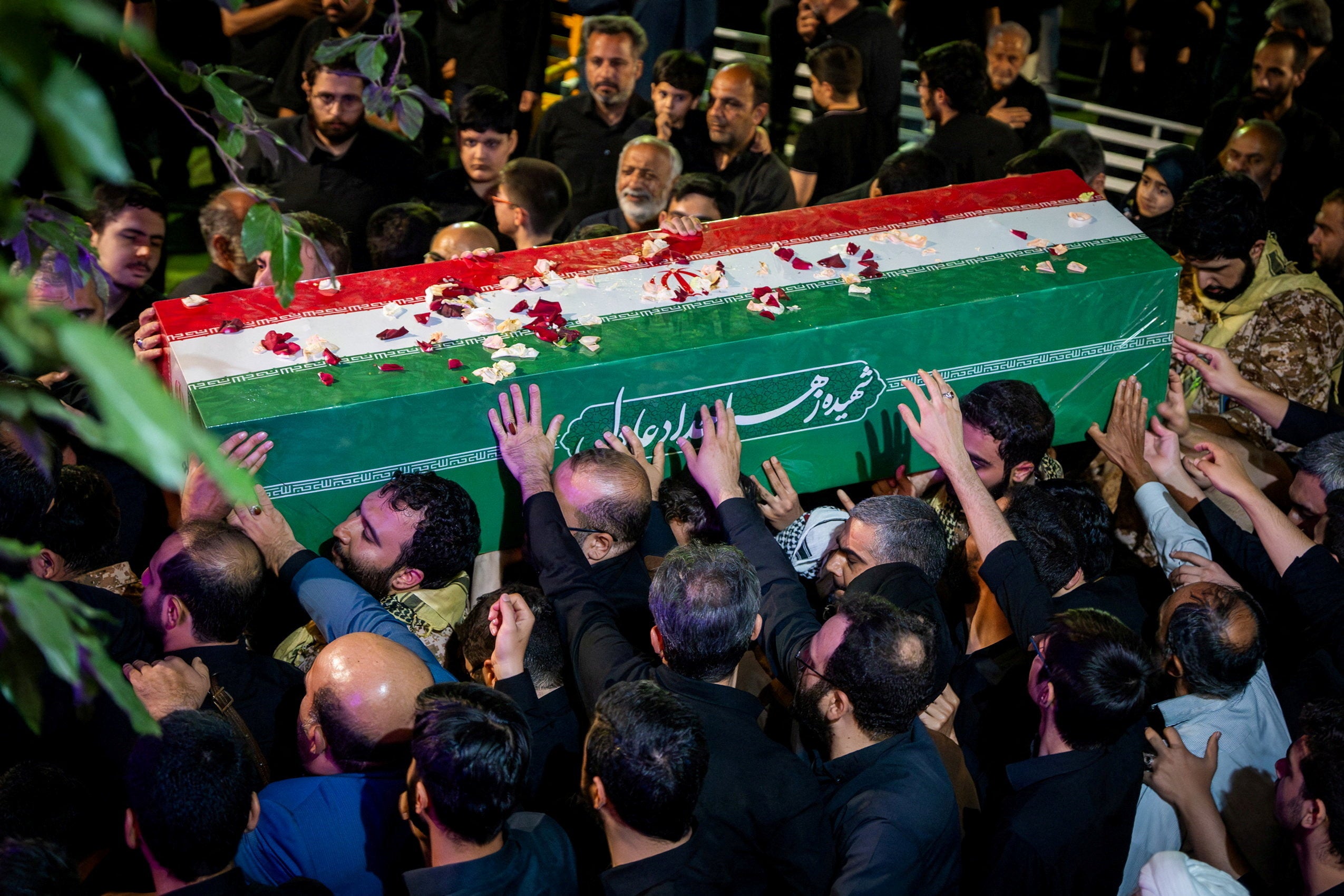 Mourners attend a farewell ceremony for Zahra Haddad Adel, wife of Iran's Supreme Leader Mojtaba Khamenei, who was killed on February 28 in Israeli and U.S. airstrikes, in Tehran, Iran, in this handout image released on July 2, 2026. (Reuters)