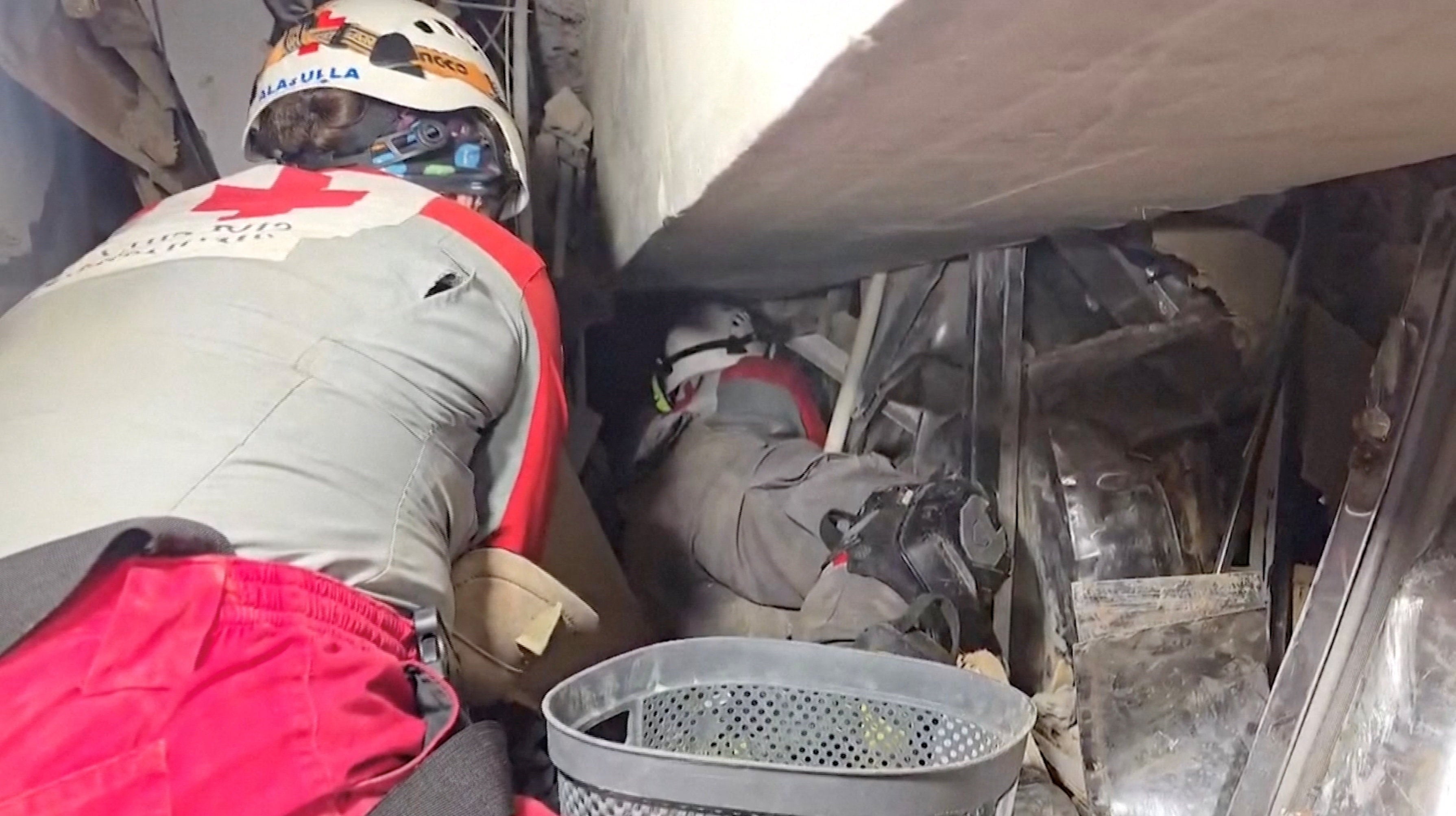 Rescuers try to find survivor Hernan Alberto Gil, who has been trapped among rubble at a mall basement for over a week following the earthquake, in Playa Grande, La Guaira, Venezuela June 30, 2026 in this screengrab taken from a handout video. COSTA RICAN RED CROSS/Handout via REUTERS