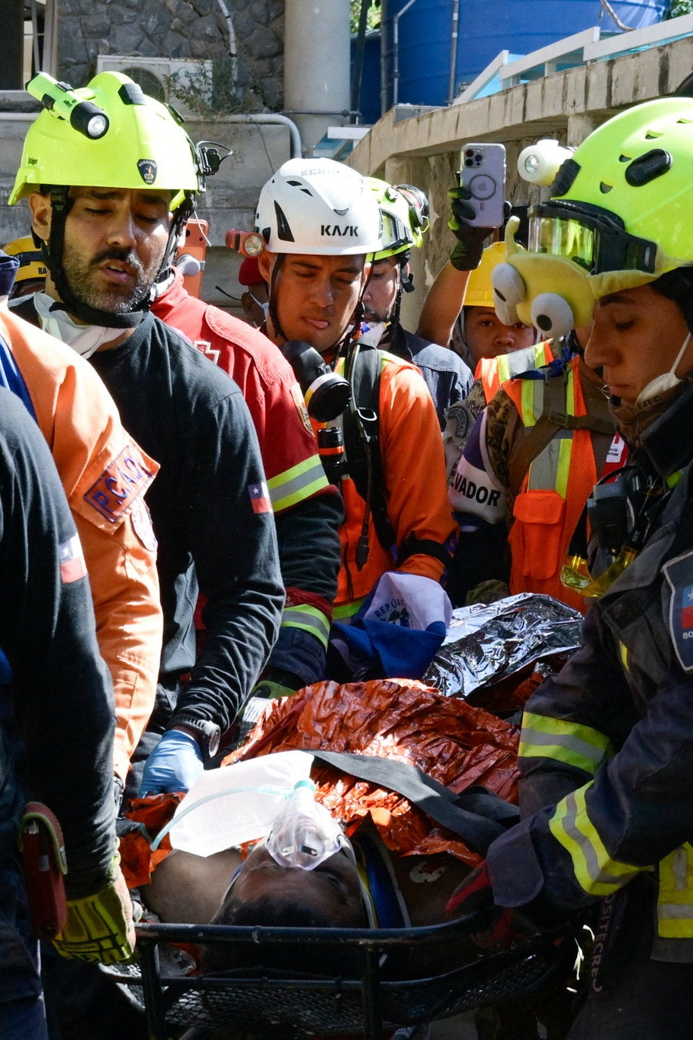 Rescue workers transport survivor Hernan Alberto Gil, who was trapped for over a week following June 24 earthquakes, from a collapsed mall in La Guaira, Venezuela, July 2, 2026. REUTERS/Maxwell Briceno (Reuters)