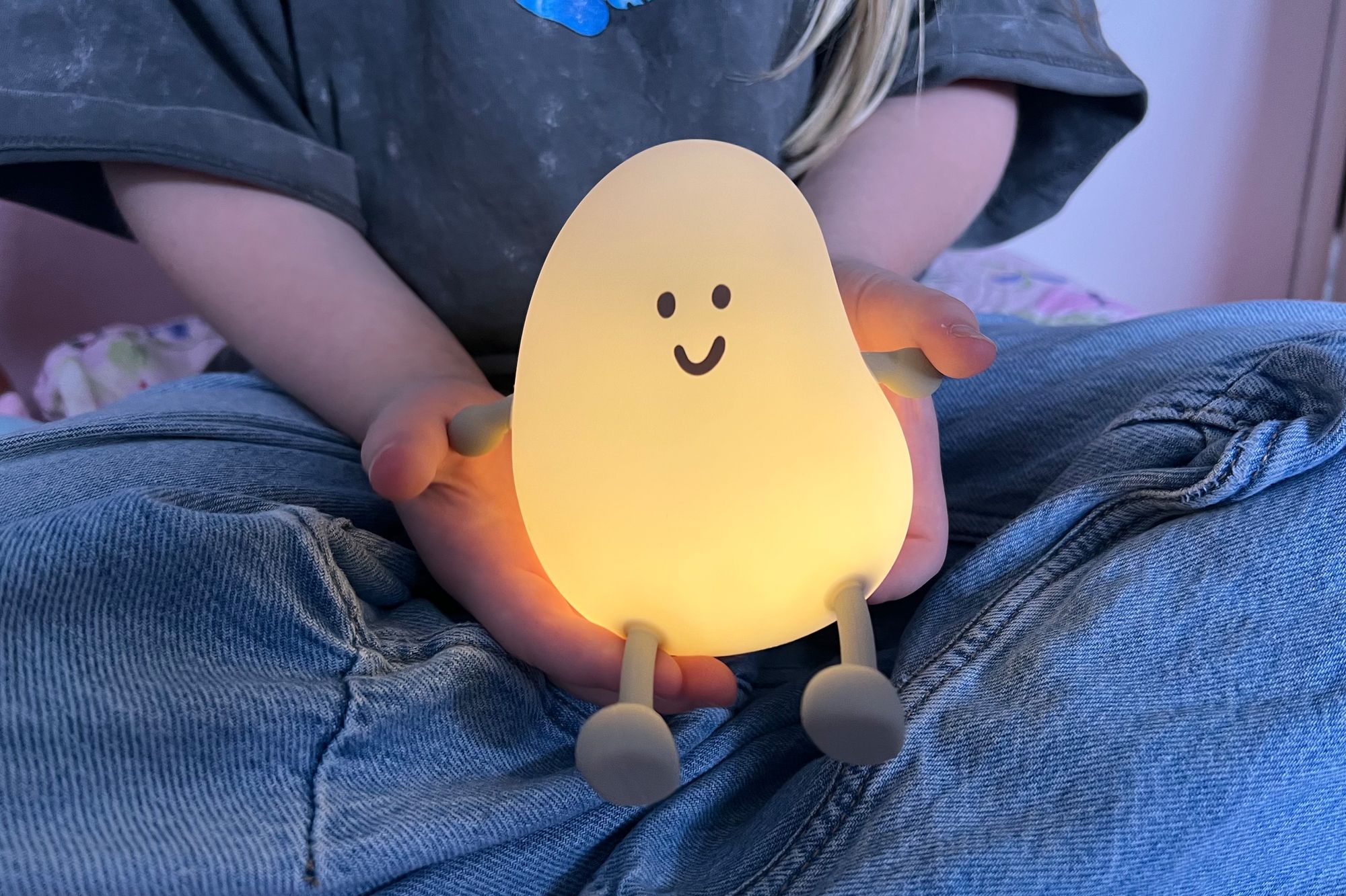 The adorable reading light has dimming options (Sarah Dawson/The Independent)