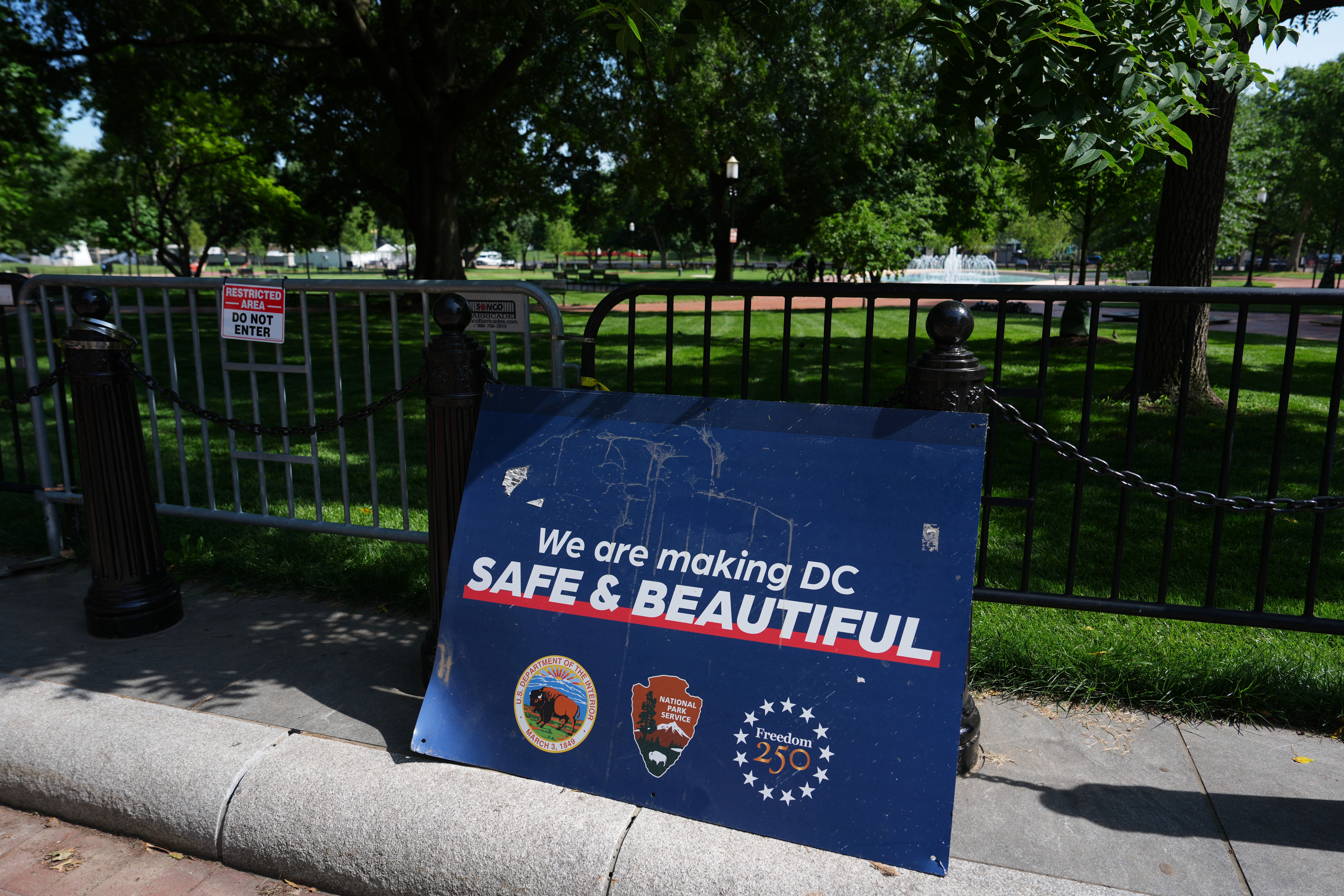 An America 250 sign sits outside Lafayette Park near the White House, Tuesday, June 30, 2026, in Washington. (AP Photo/Julia Demaree Nikhinson) (AP)