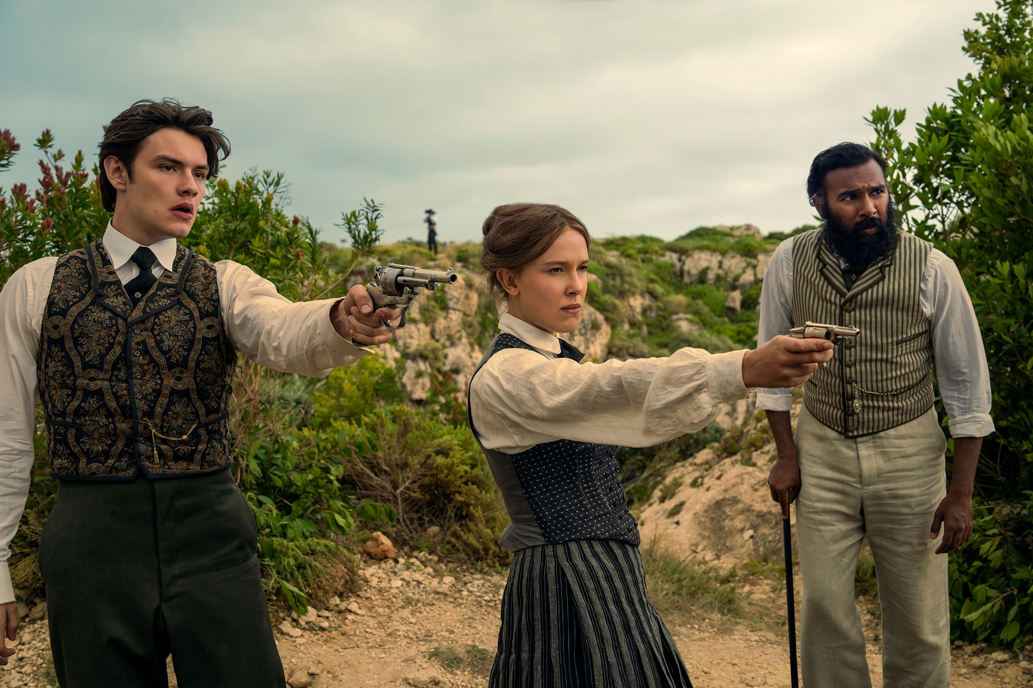 Louis Partridge, Millie Bobby Brown and Himesh Patel in ‘Enola Holmes 3’