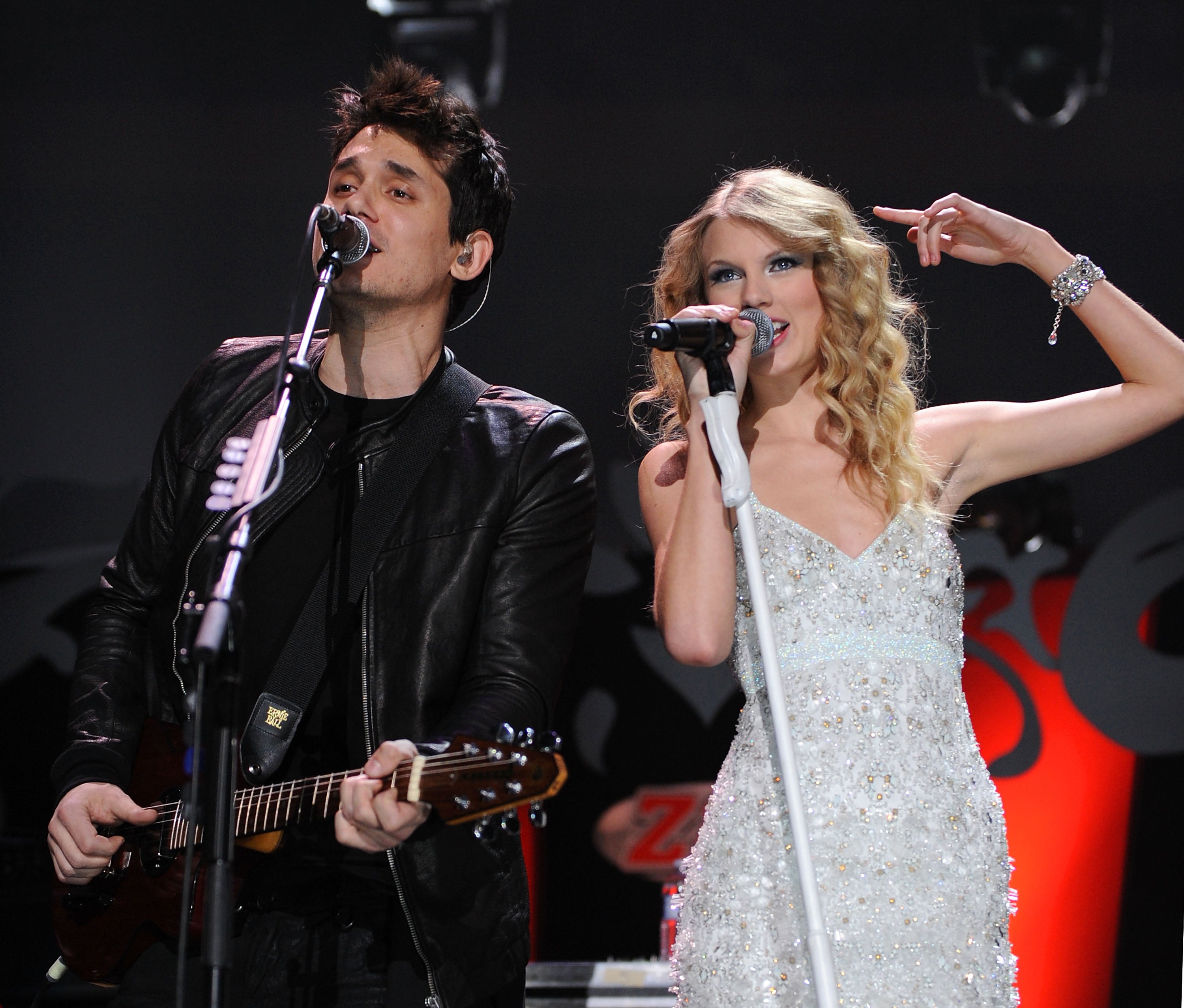 John Mayer and Taylor Swift perform onstage during Z100's Jingle Ball 2009 at Madison Square Garden.