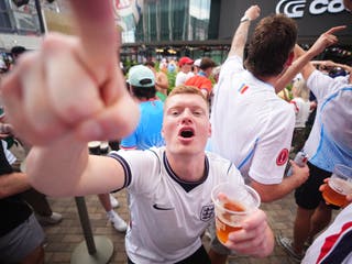England fans celebrate in a bar near the Atlanta Stadium in Atlanta, Georgia, following Englandโs victory against DR Congo at the 2026 Fifa World Cup (James Manning/PA)