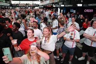 Fans watch a screening of the Fifa World Cup match between England and the DR of Congo at Boxpark Wembley, London (Steven Paston/PA)