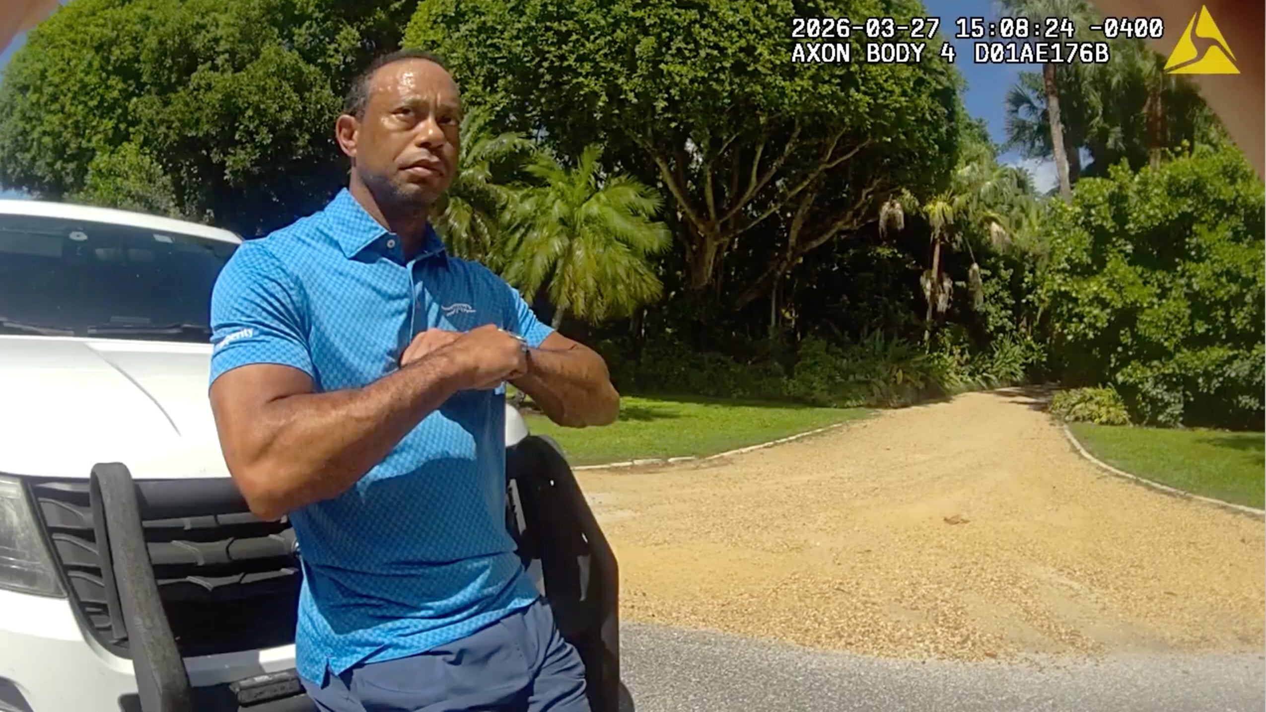 Tiger Woods performs a field sobriety test for sheriff's deputies following a car crash in Jupiter Island, Fla., March 27, 2026