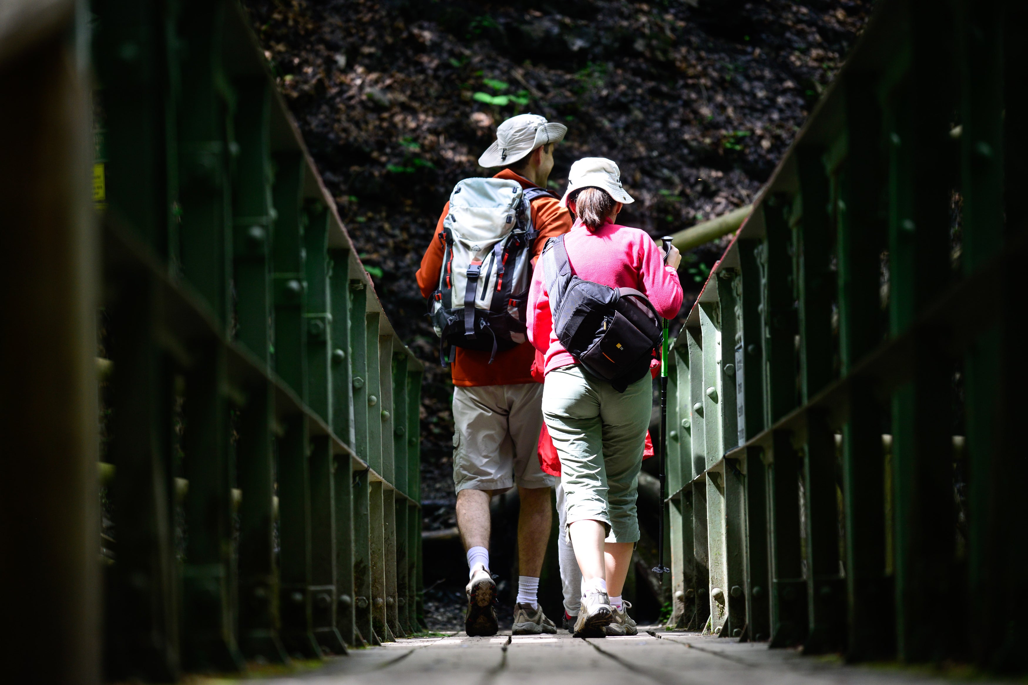 Hikers cross a bridge in the Bavarian Alps in June 2015 near Garmisch-Partenkirchen, Germany. Adventurous types should pack blister pads