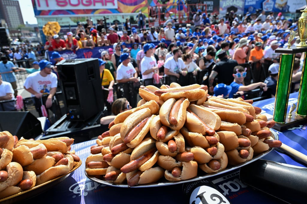 The famous Fourth of July hot dog eating contest in New York tied them to the nation's birthday (Getty Images)