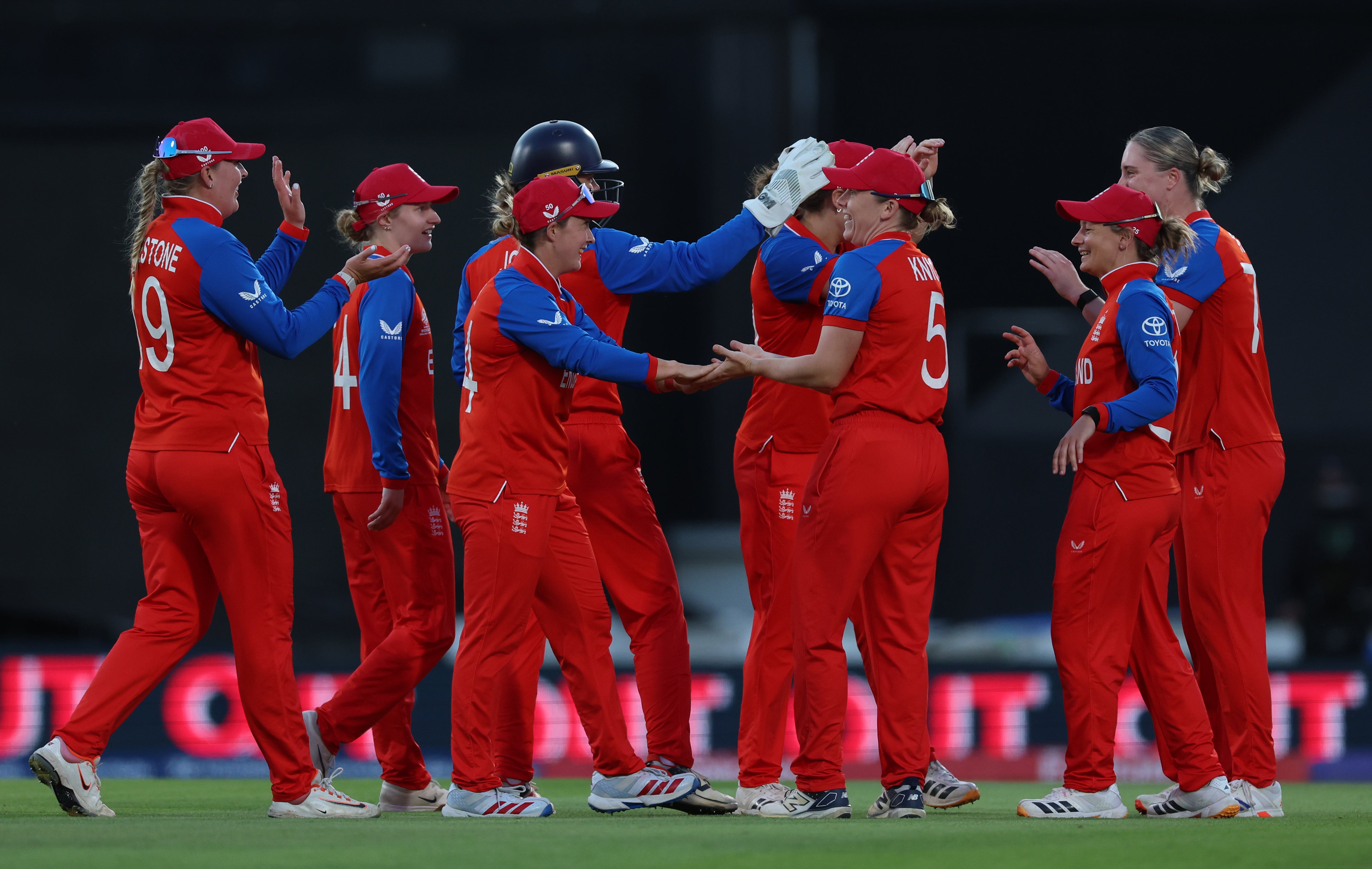 England players celebrate taking the wicket of South Africa’s Annerie Dercksen (Steven Paston/PA)