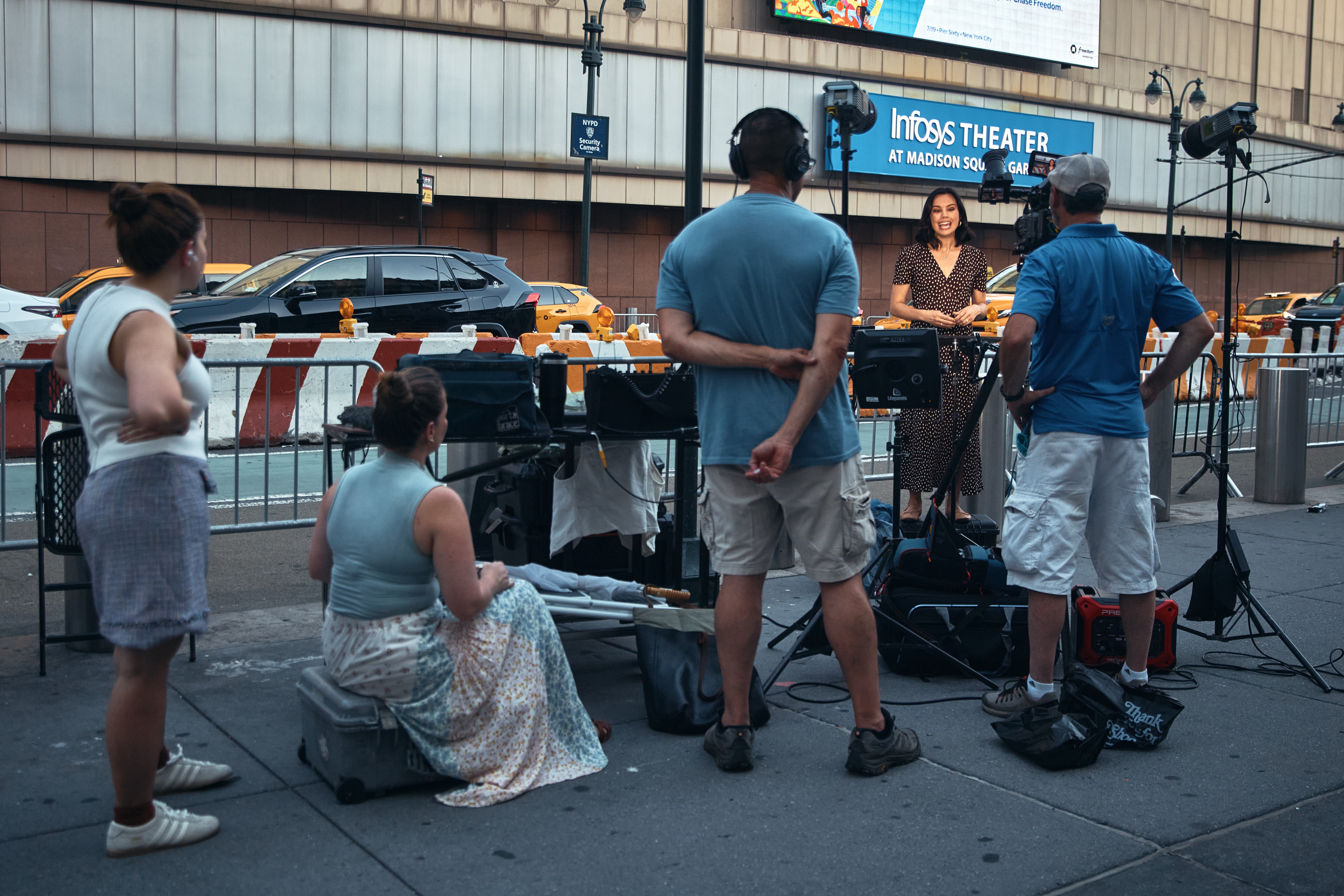 Media members worked outside of Madison Square Garden as preparations for Taylor Swift's wedding took place Thursday