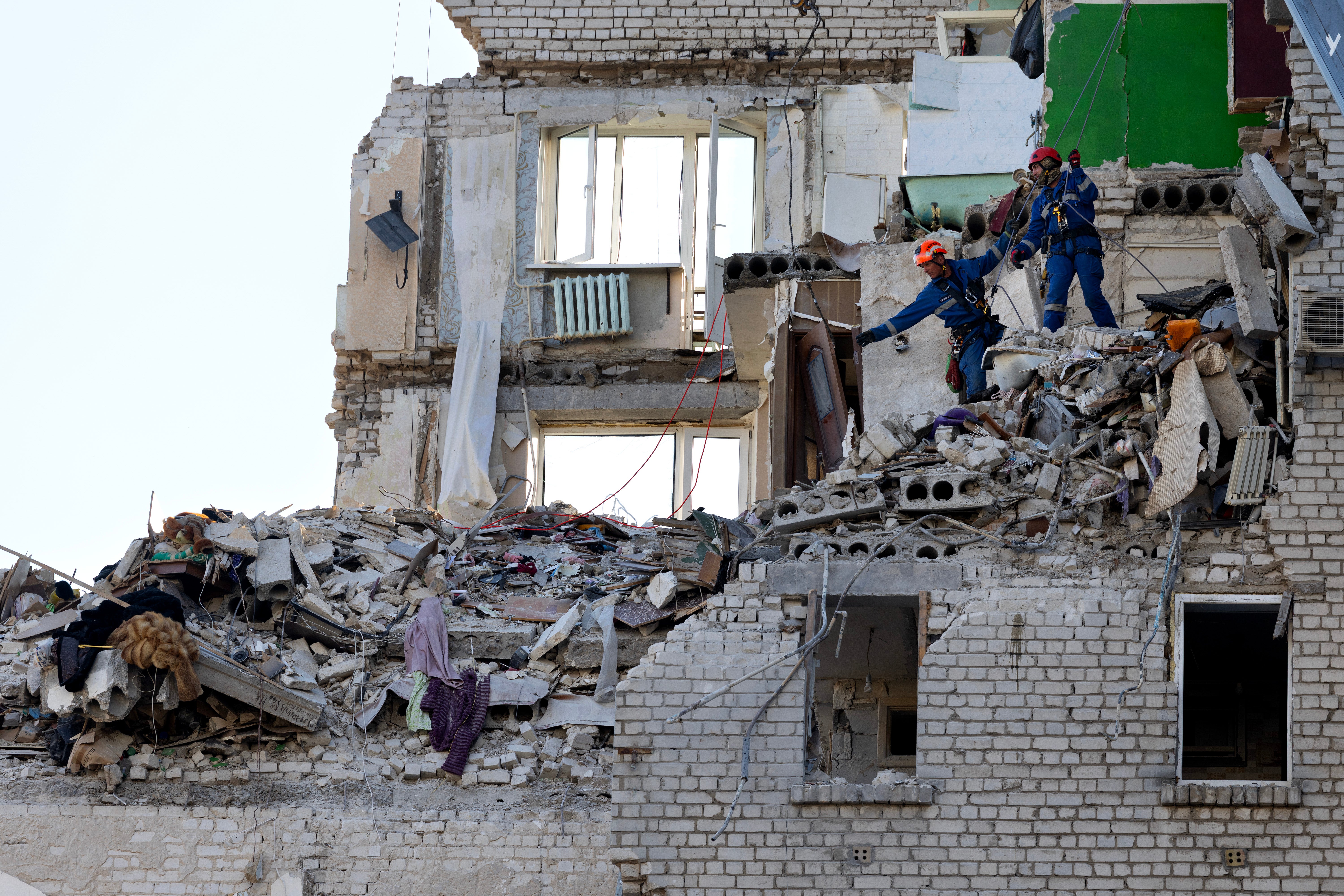 Rescue workers continue to search for survivors after a missile attack in Kyiv (Getty)