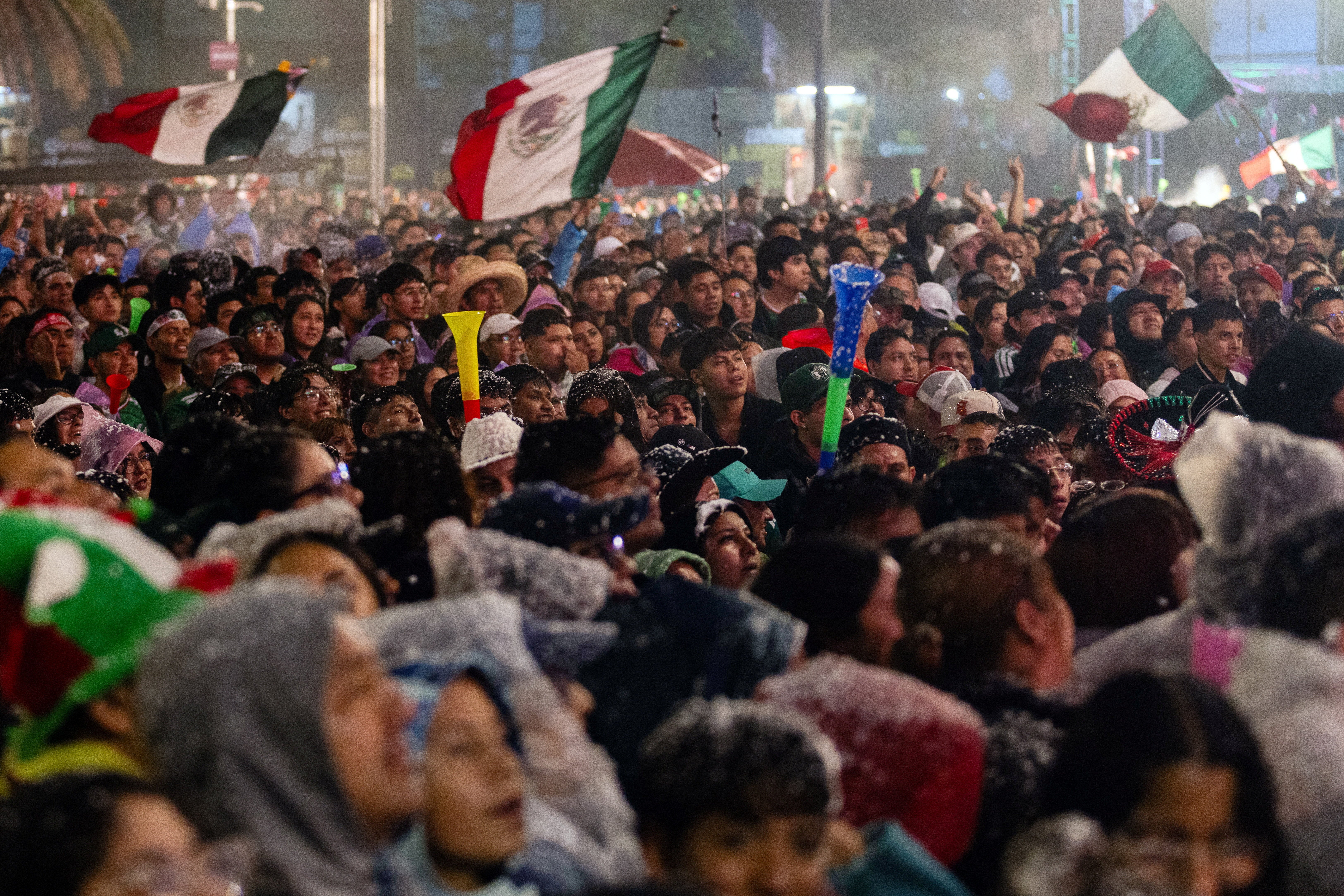Fans gather to watch the Round of 32 match between Mexico and Ecuador at the 2026 FIFA World Cup, as post-match celebrations following Mexico's victory left four people dead, including three from asphyxiation during late-night street festivities, in Mexico City