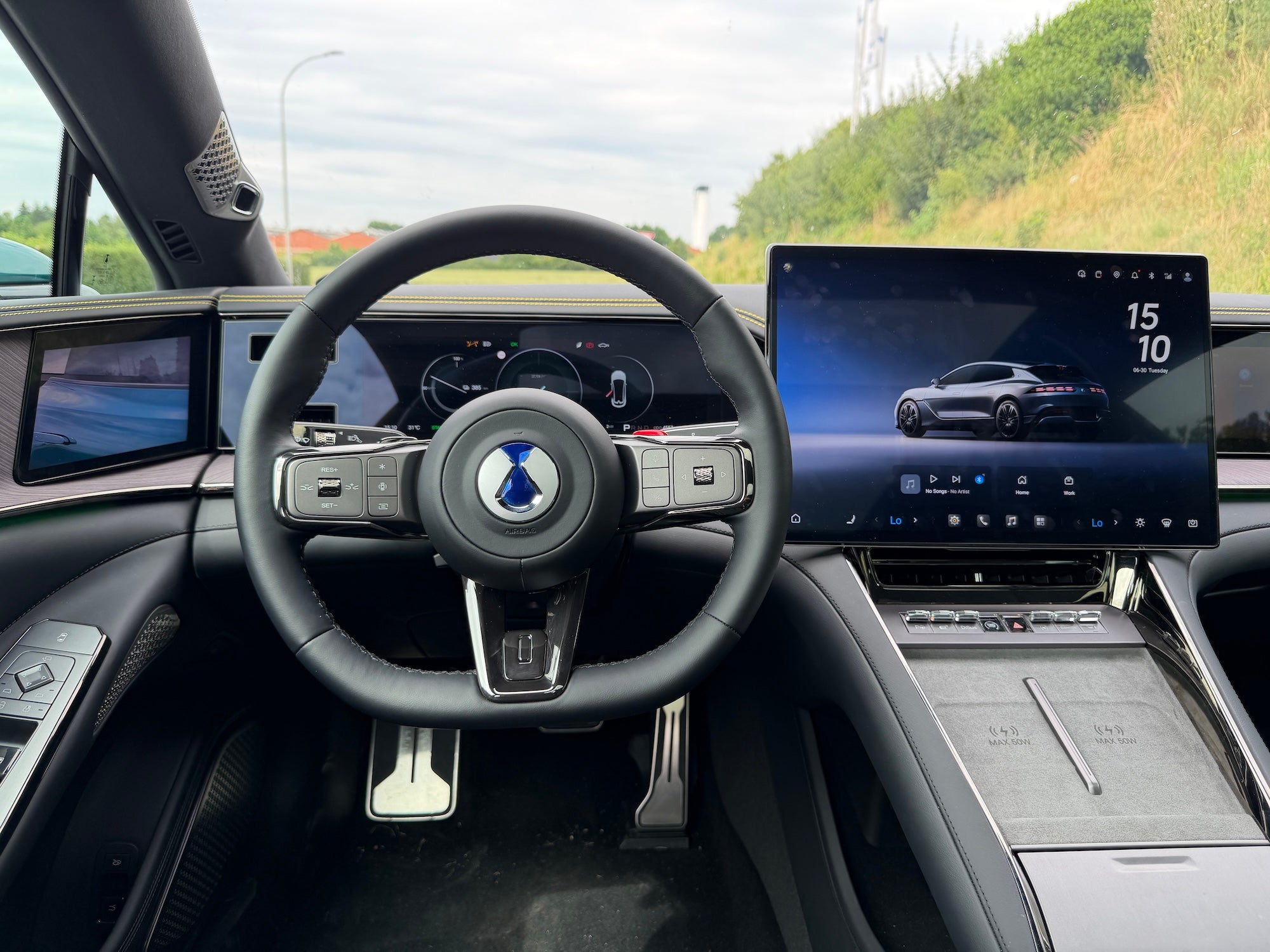 The Denza Z9 GT's main infotainment screen is a large 17.3-inch display floating in the middle of the dashboard, joined by a 13.2-inch driver display (Steve Fowler)