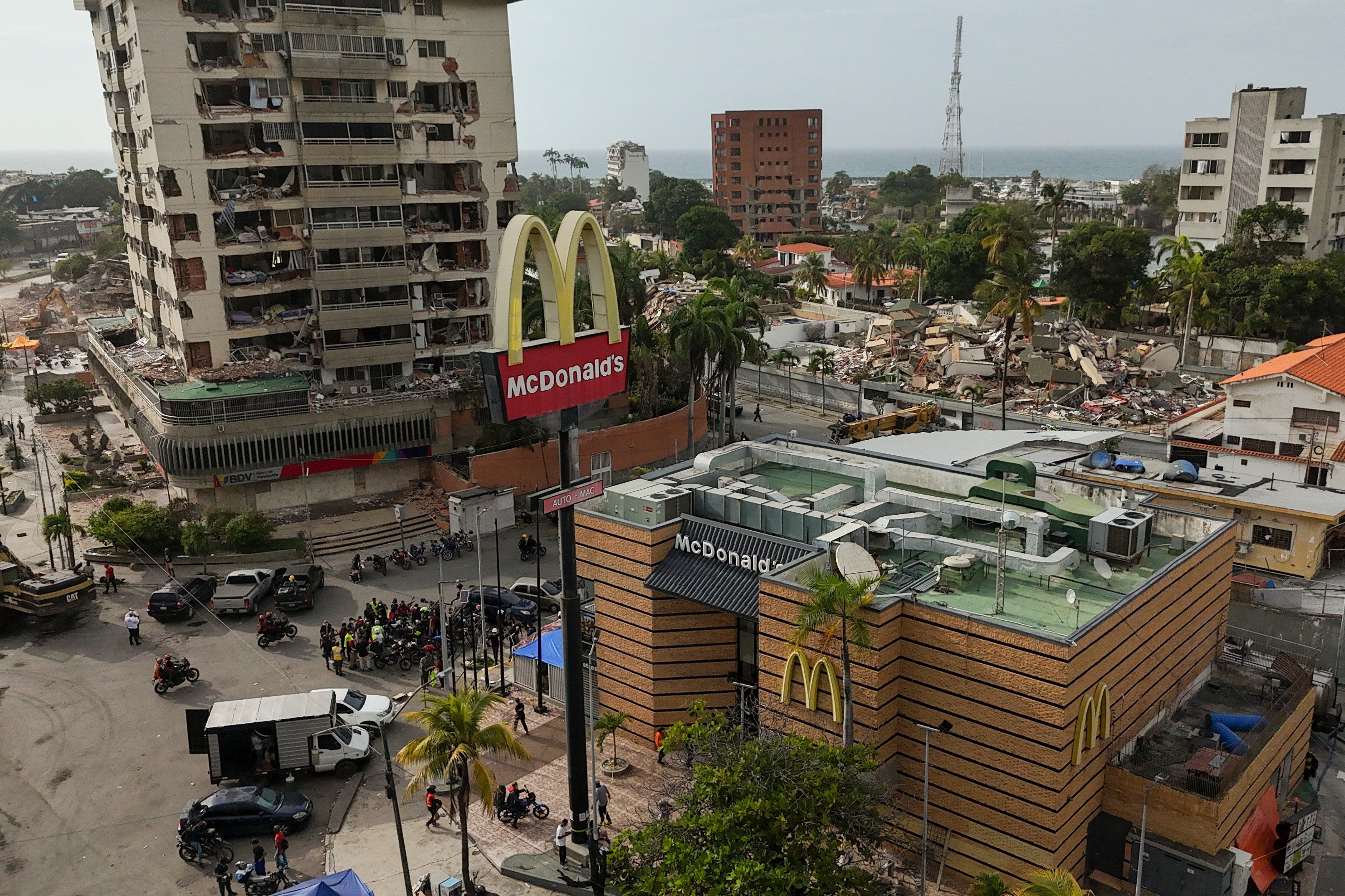 A McDonald's restaurant is being used as a temporary health center and pet reunification center after the earthquakes that struck La Guaira (AP Photo/Matias Delacroix)