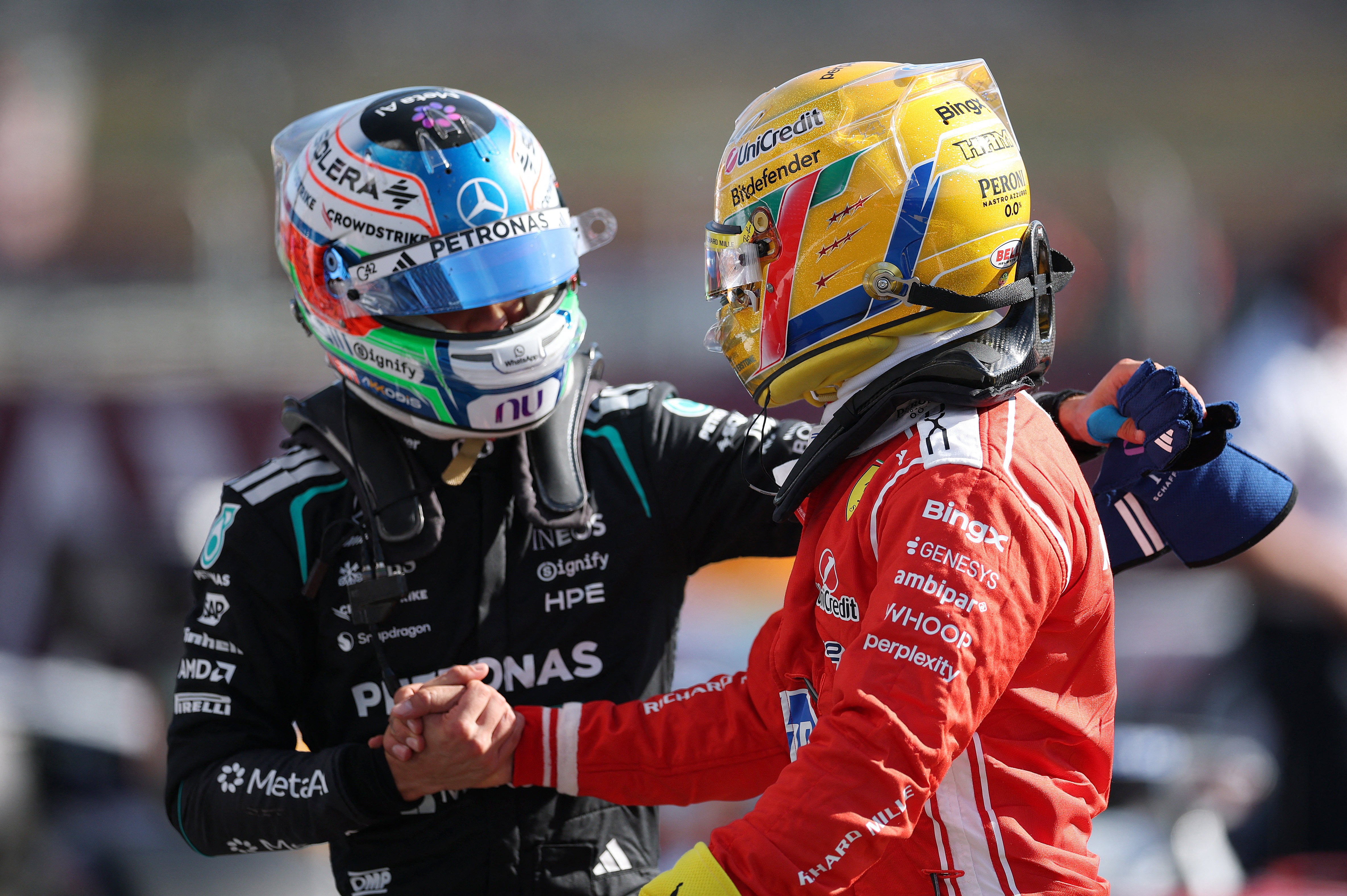 Hamilton (right) is congratulated by Kimi Antonelli
