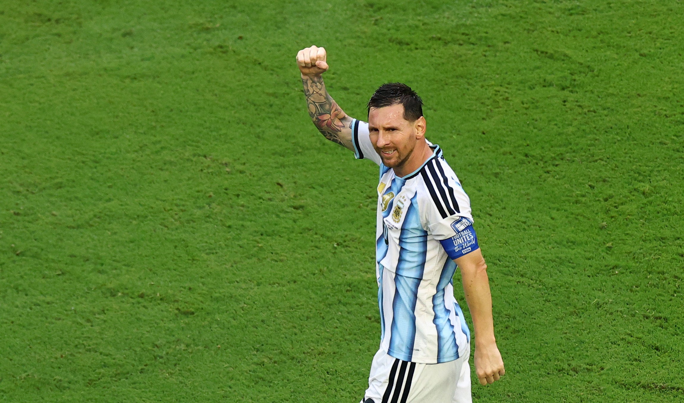 Argentina's Lionel Messi celebrates scoring their first goal
