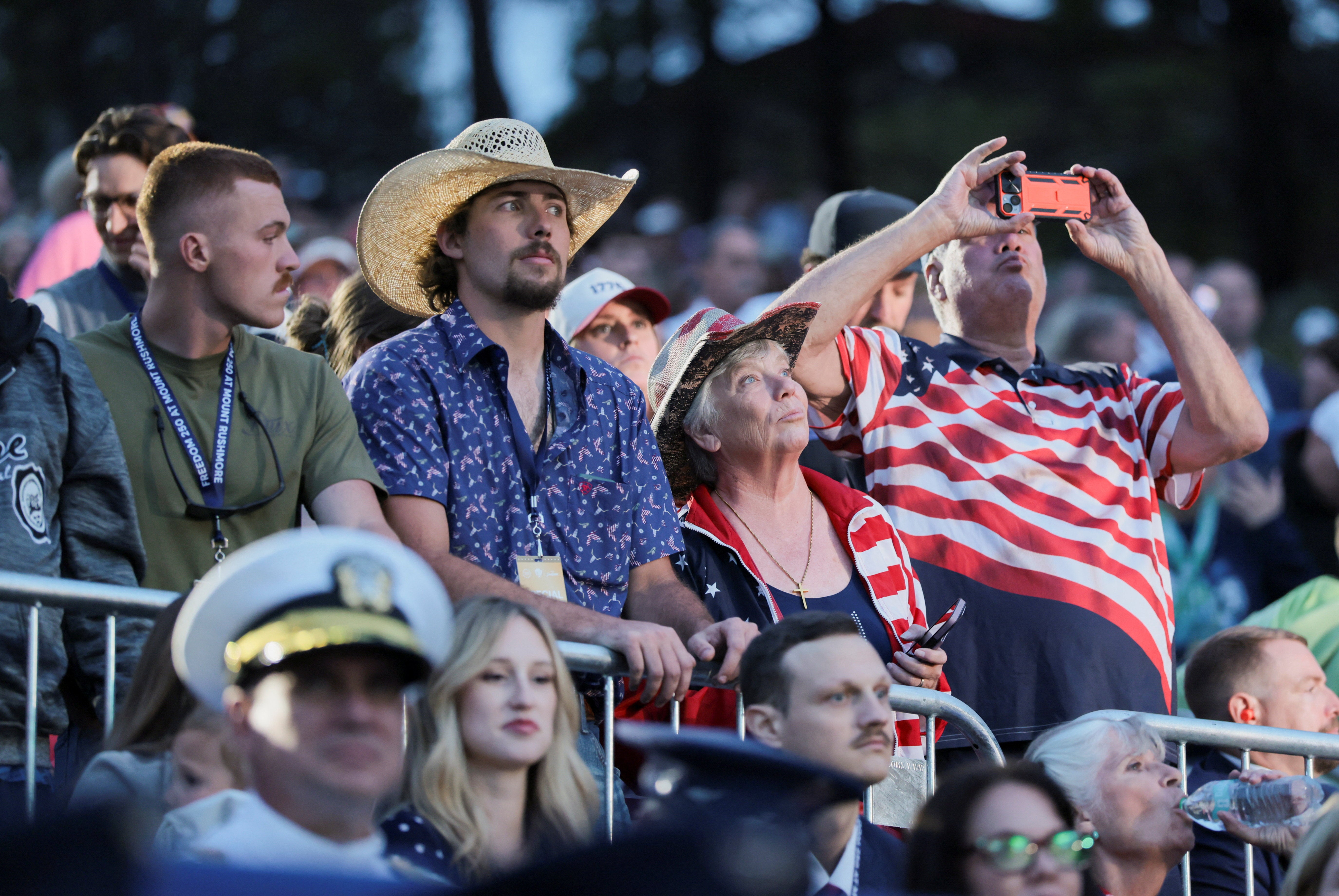 Many in the crowd were wearing red, white and blue for July 4 (Reuters)
