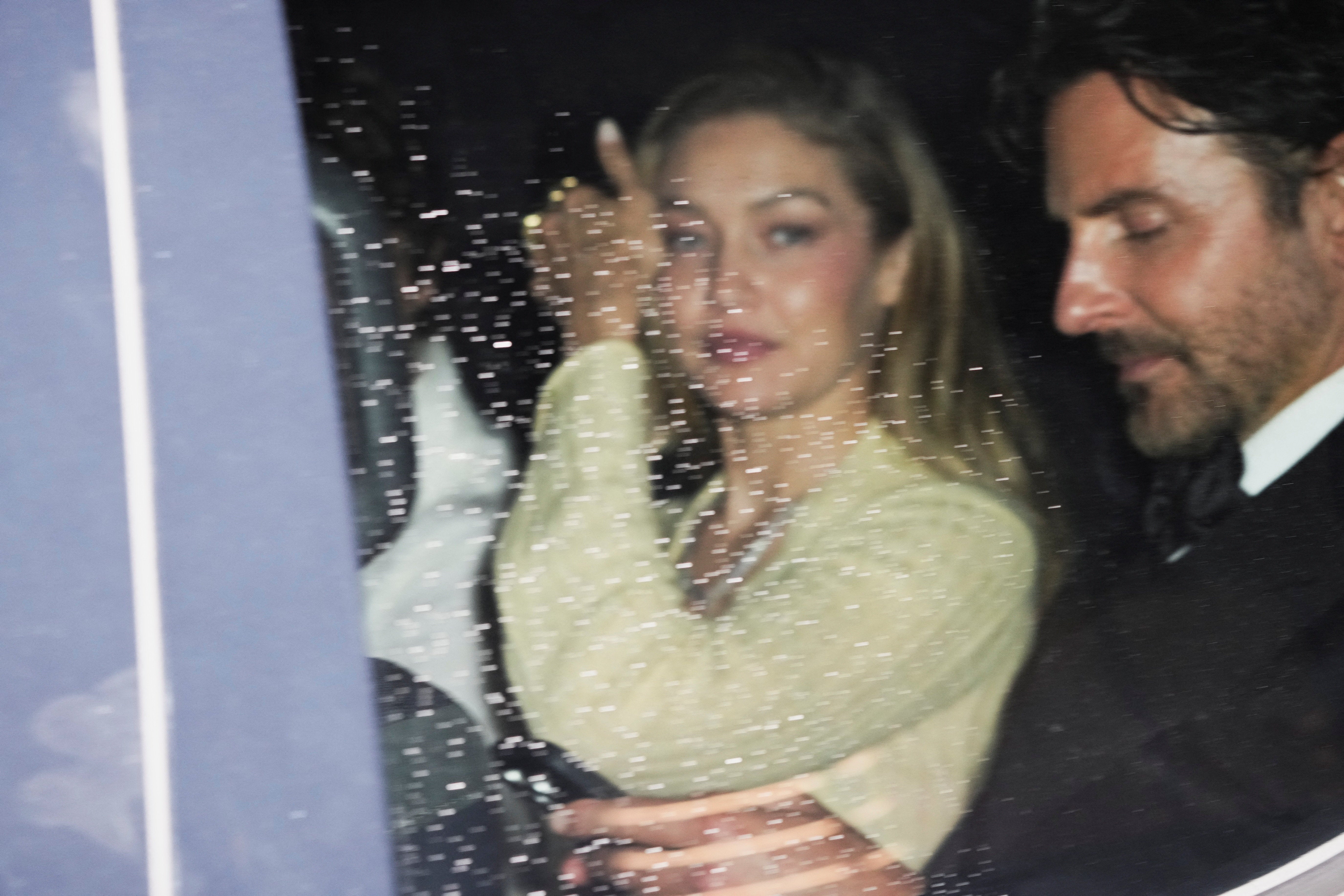 Bradley Cooper and Gigi Hadid leaving Taylor and Travis’s wedding celebrations